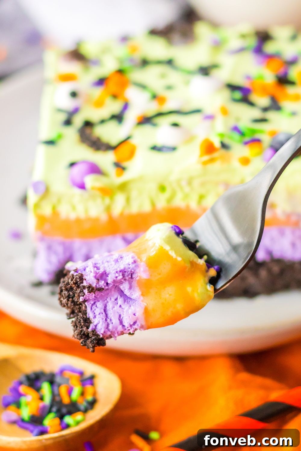 fork with a bite of layered Halloween lush on fork 