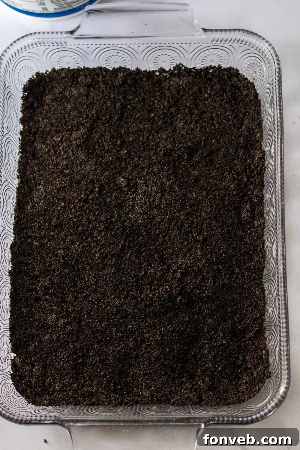 dirt crumbs spread in a baking dish