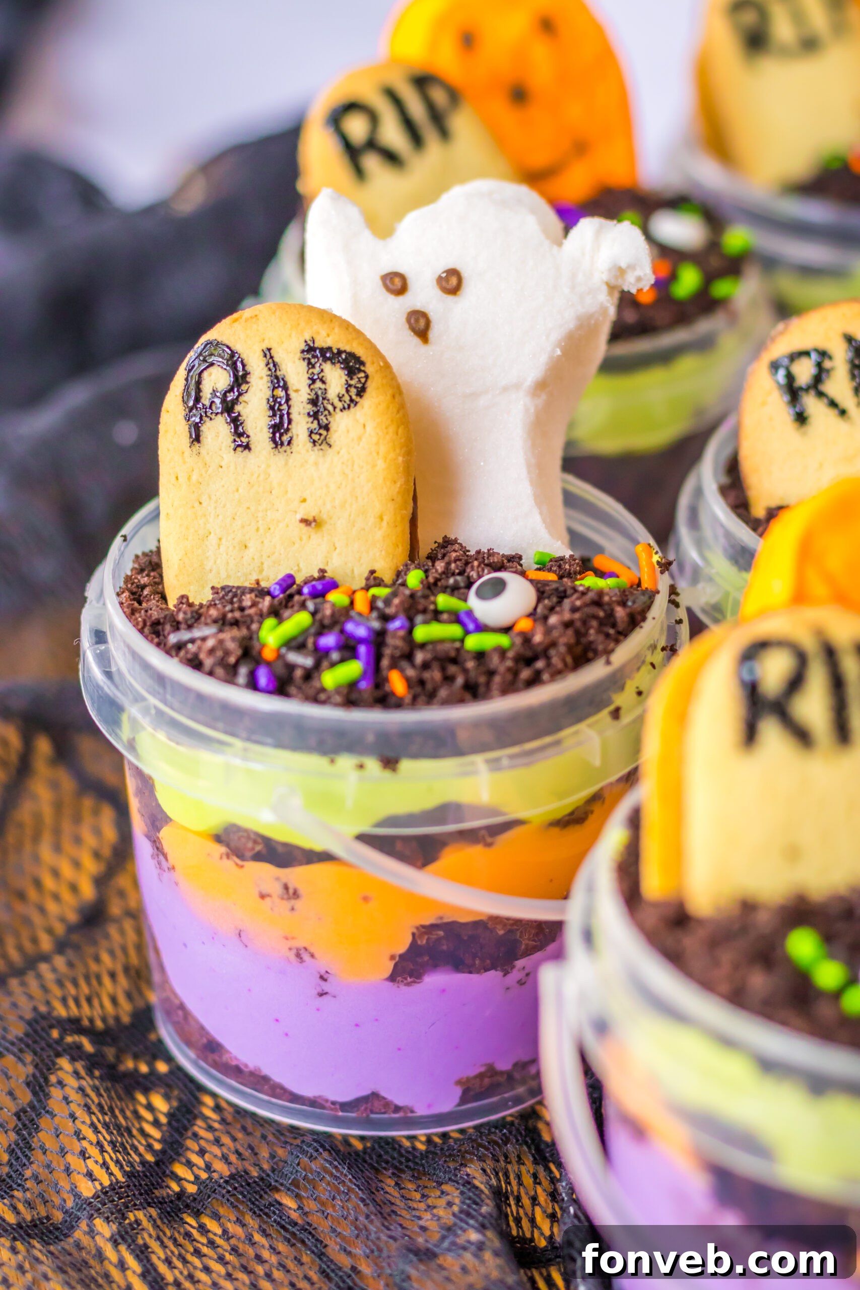 Monster Mash Pudding Treats 14 close up of dirt cake halloween dessert in a bucket