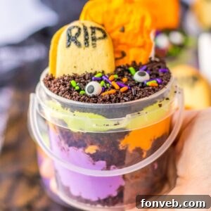 Monster Mash Pudding Treats 19 Halloween Pudding Cup in hand