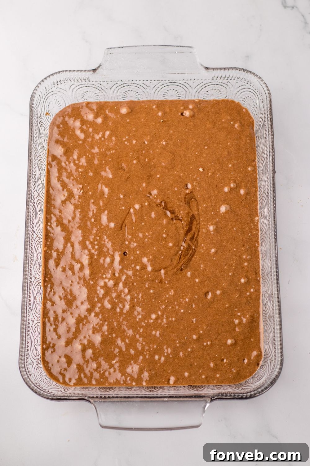 Monster Mash Pudding Treats 6 chocolate cake batter in a 9x13 baking dish on table