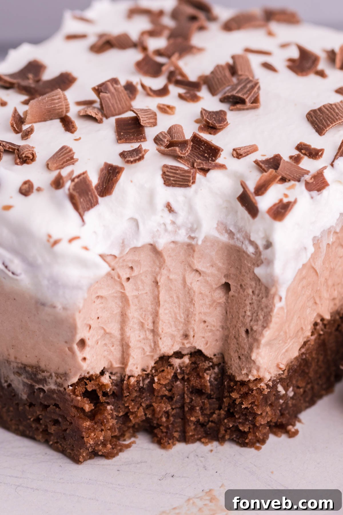 up close shot of the french silk brownies with a bite missing