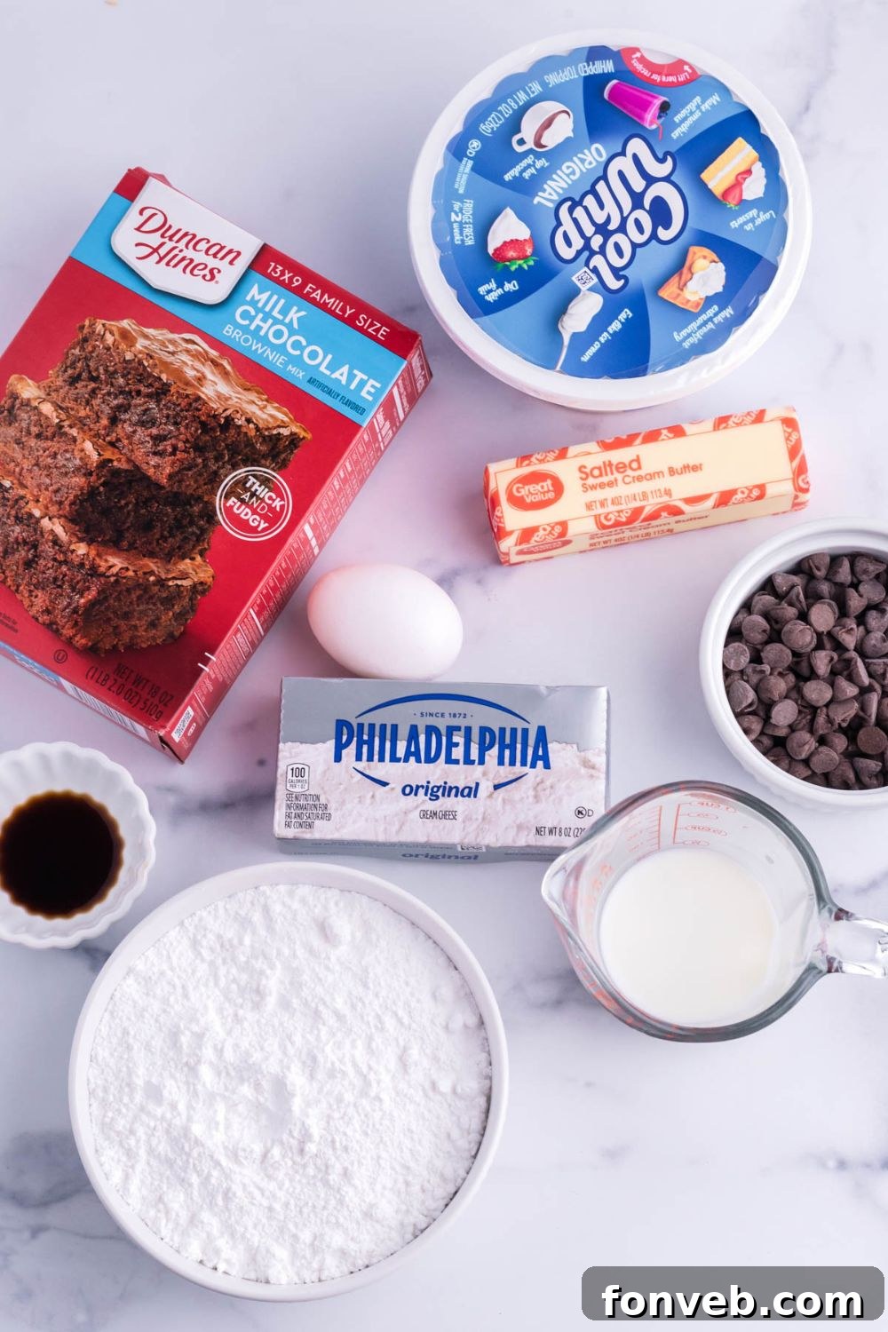 Ingredients on marble counter for French silk pie brownies recipe