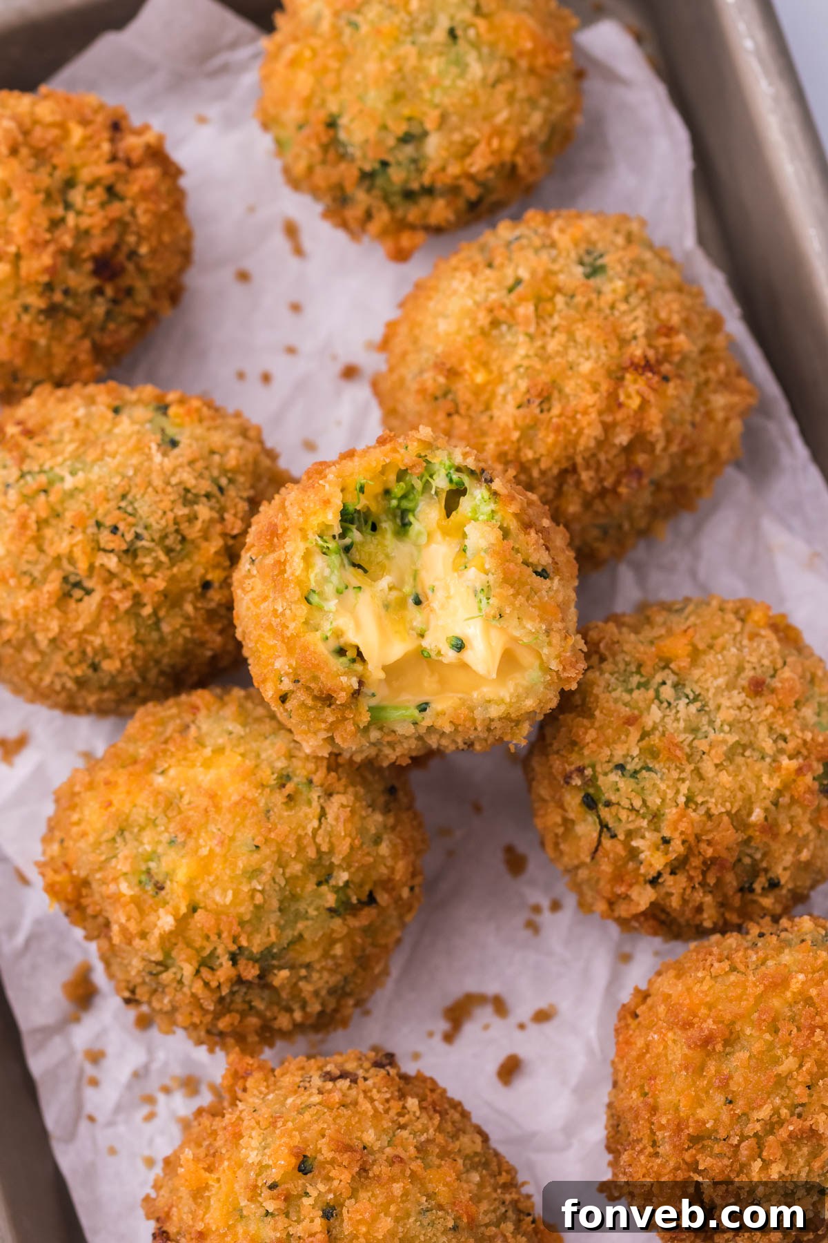 Crispy Fried Broccoli Poppers 6 Fried Broccoli Bites sitting in rows on a silver baking sheet