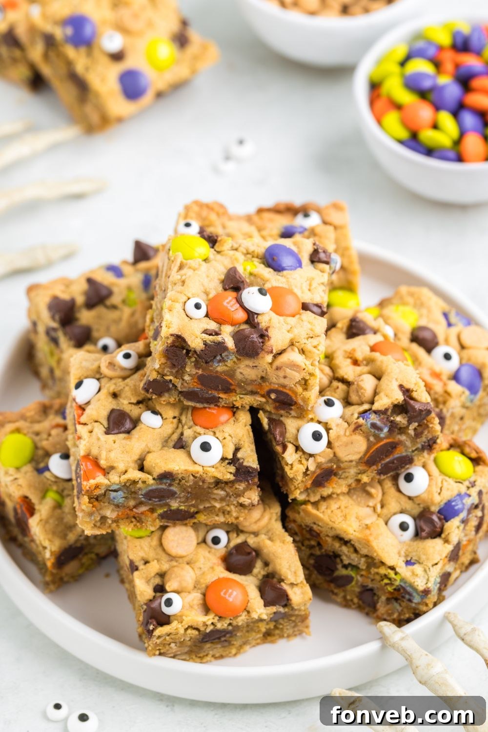 Easy chewy cookie bars, sliced and elegantly plated on a platter for serving.
