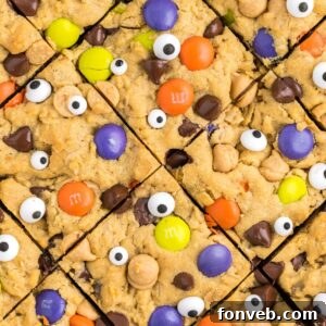 Halloween Monster Cookie Bars sliced and overhead shot of them in pan