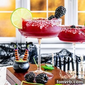 Magic Potion Margarita 18 Sanderson Sisters Margaritas on table with Halloween decorations around it