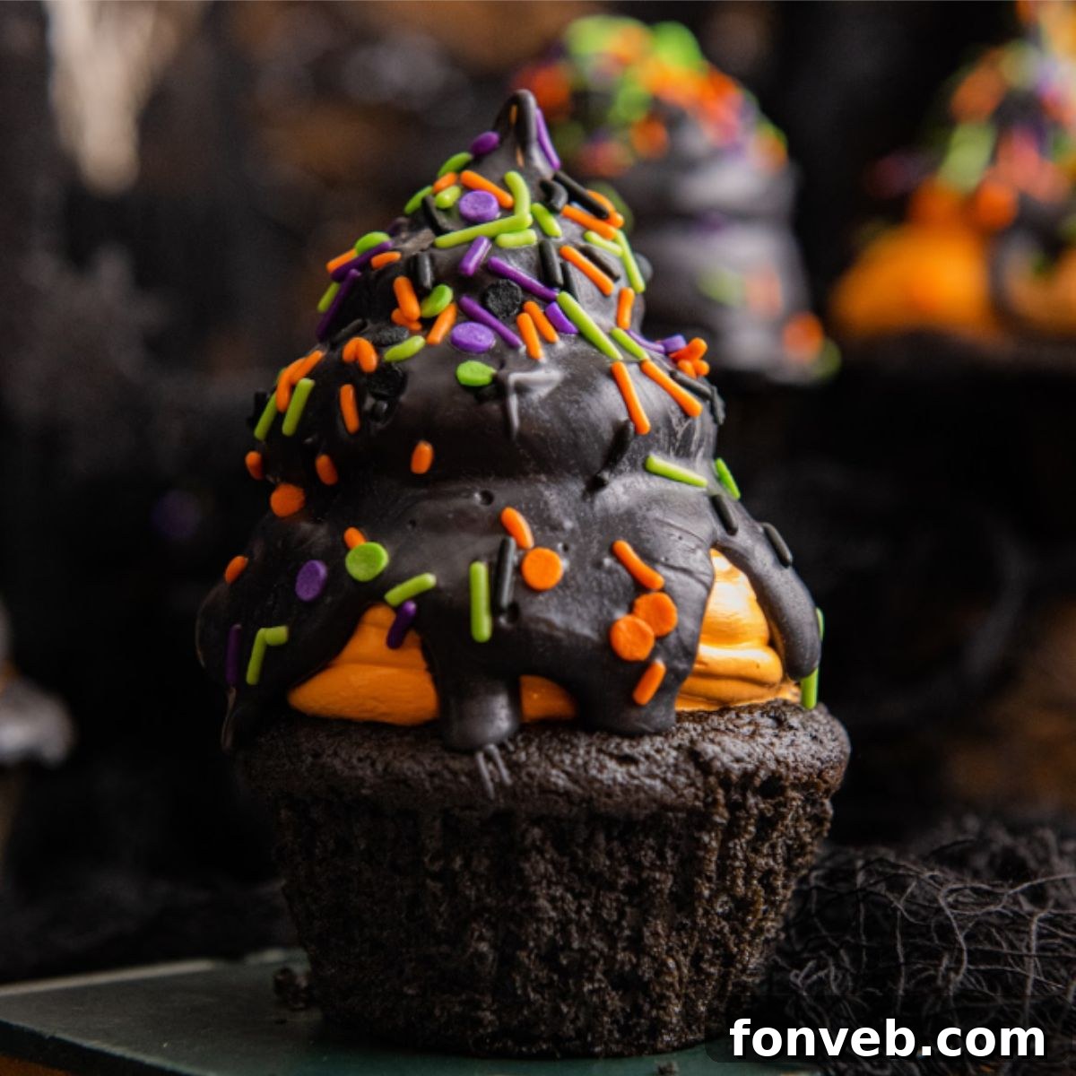 Halloween Cupcake placed elegantly on a table, highlighting its vibrant colors and intricate decoration.