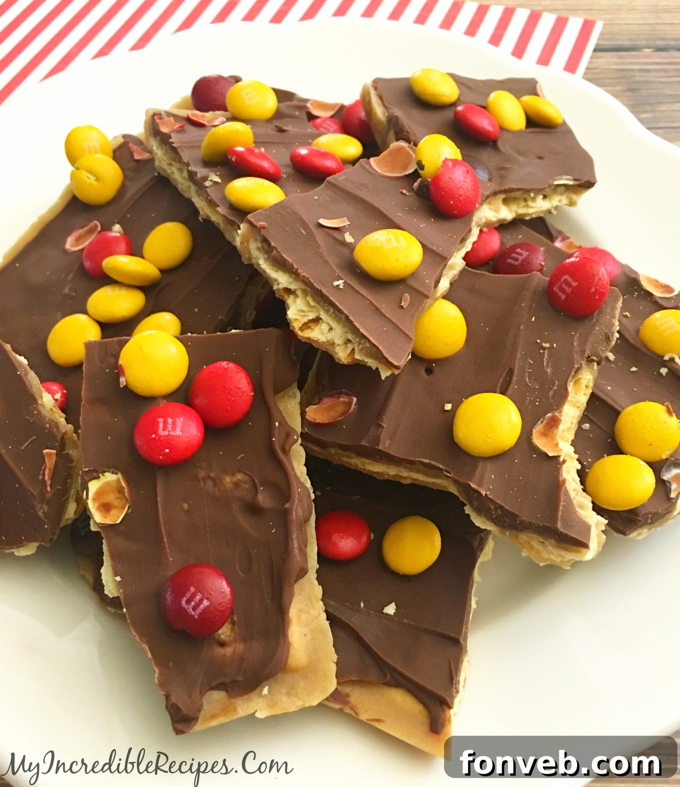 Close-up of a broken piece of saltine cracker toffee, showing the distinct layers