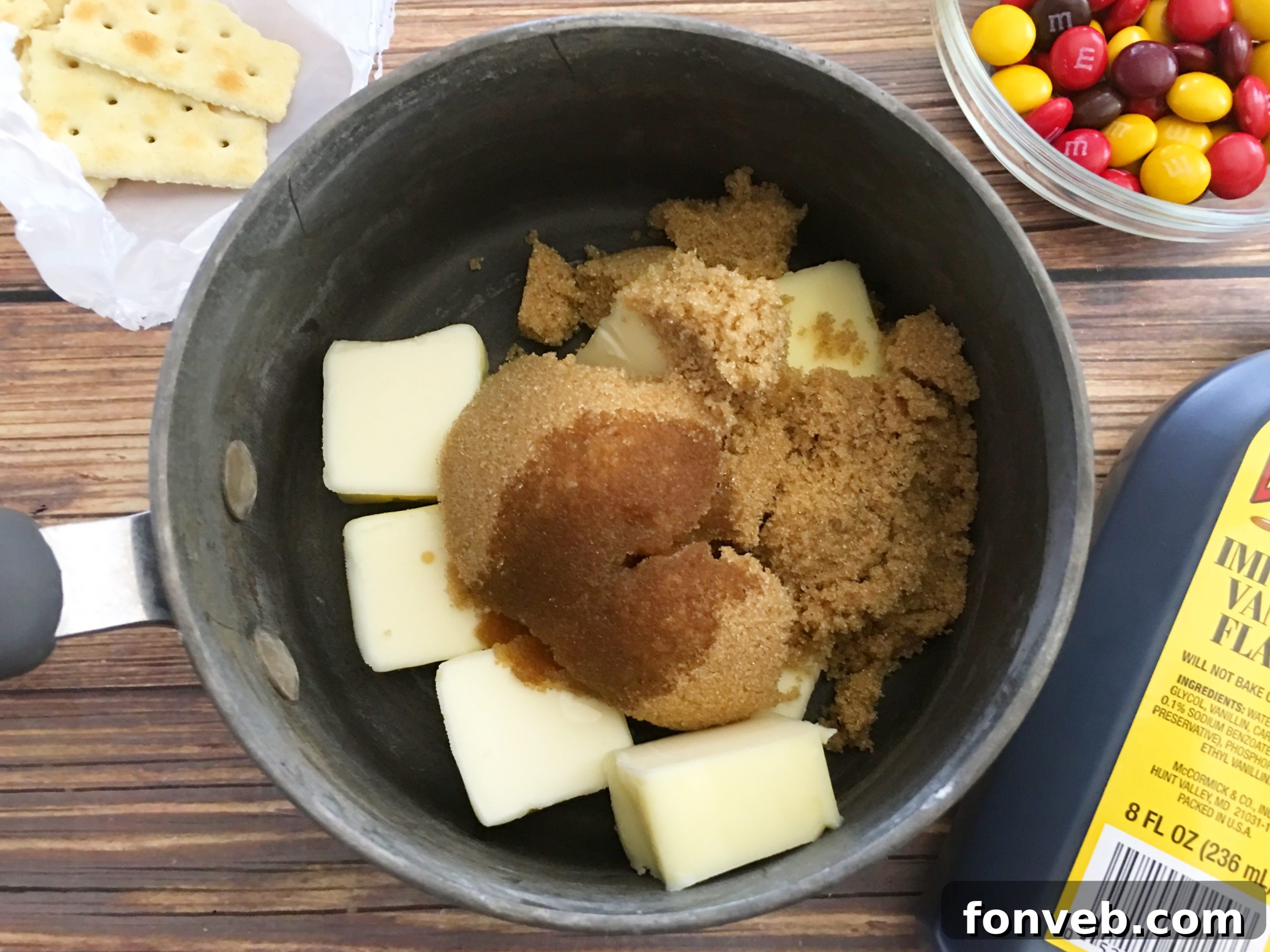 A few simple ingredients for saltine cracker toffee laid out on a table