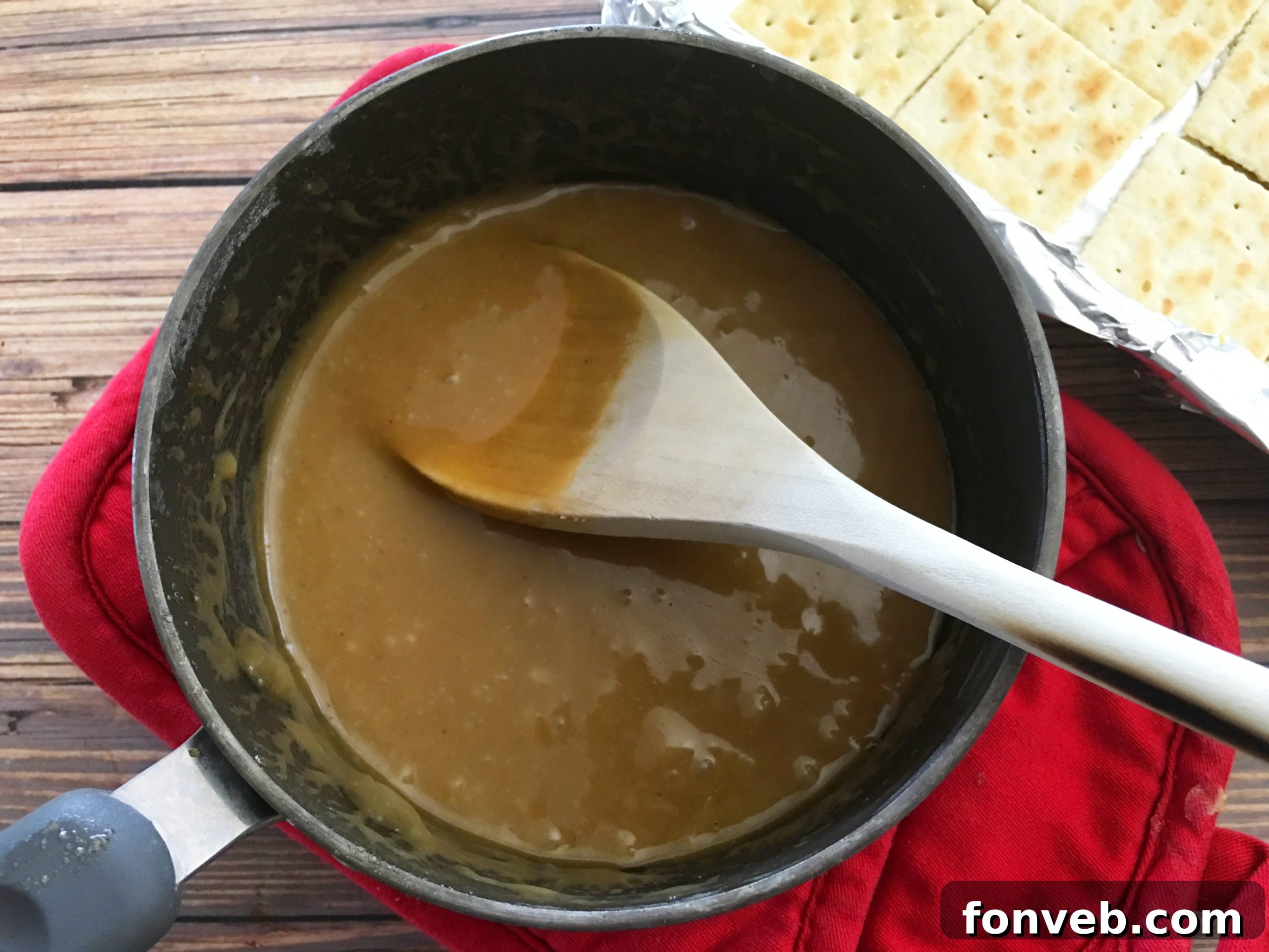 Close-up of baked saltine cracker toffee, showcasing the sweet buttery glaze
