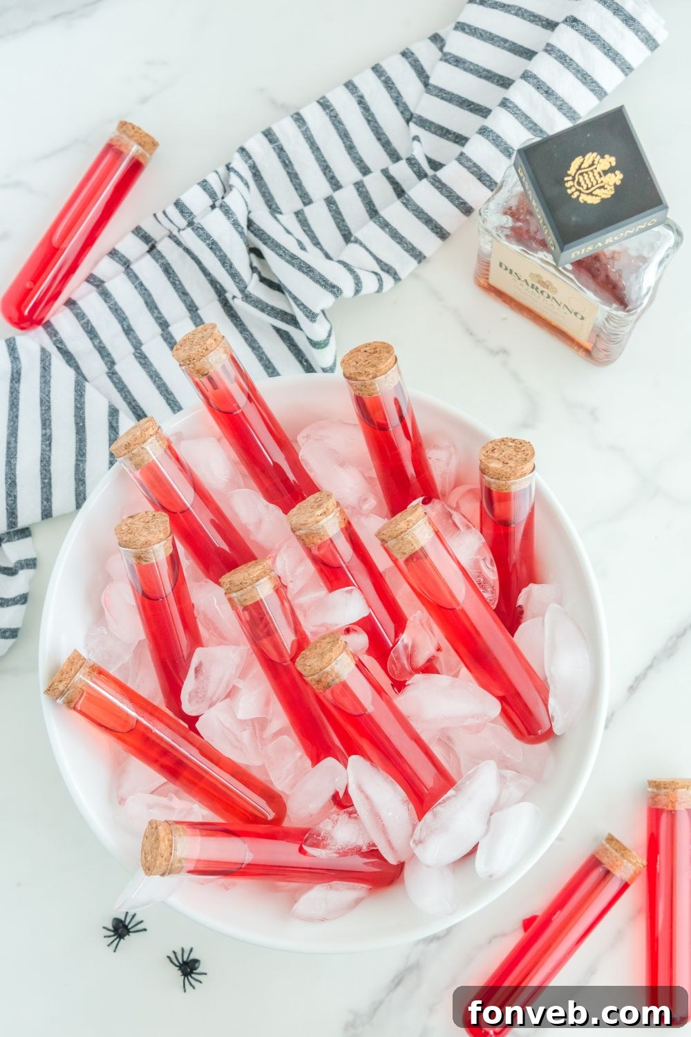 bowl of hots on table with disaronno behind it on counter
