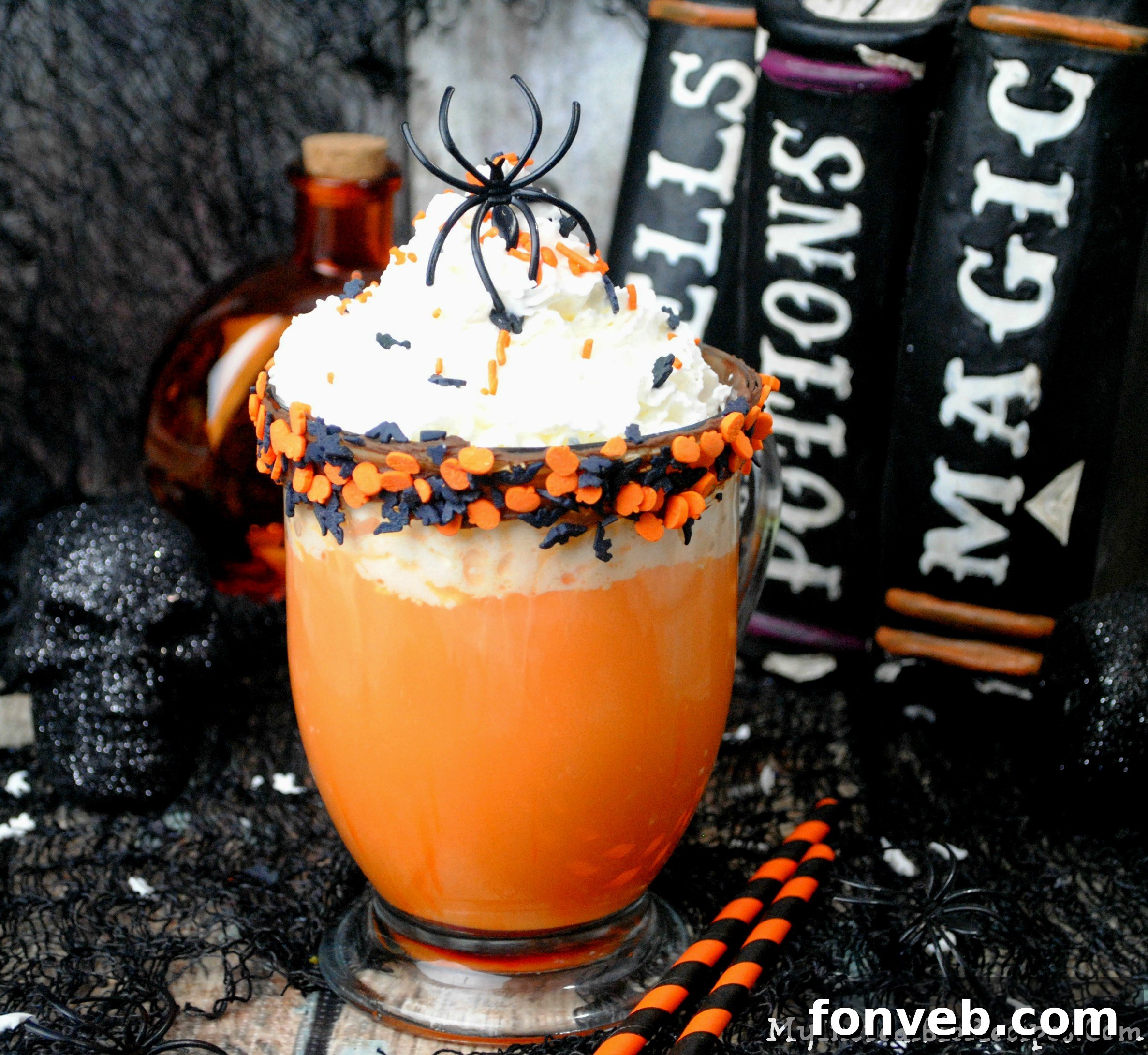 Delicious Halloween hot chocolate topped with generous whipped cream and colorful sprinkles
