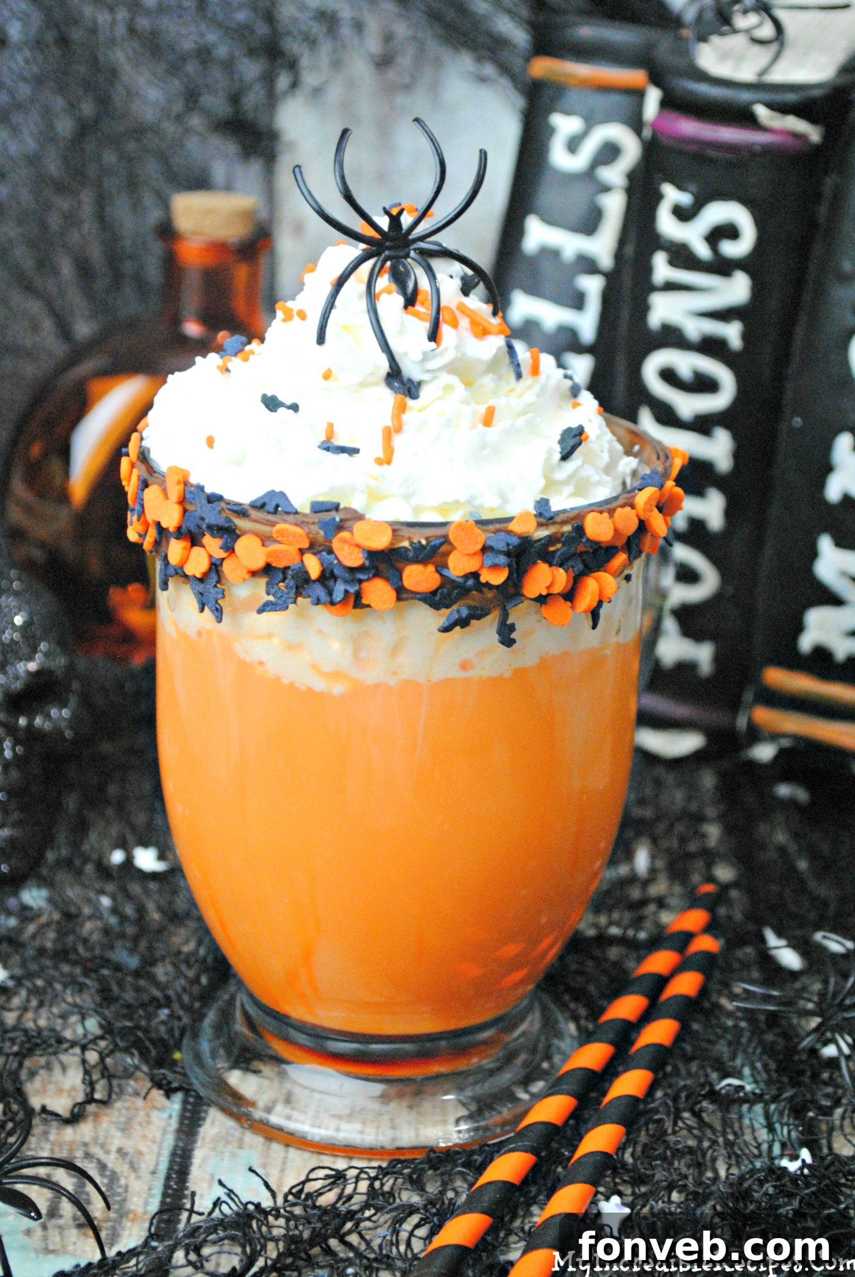 Close-up of a festive Halloween hot chocolate with a ghost marshmallow