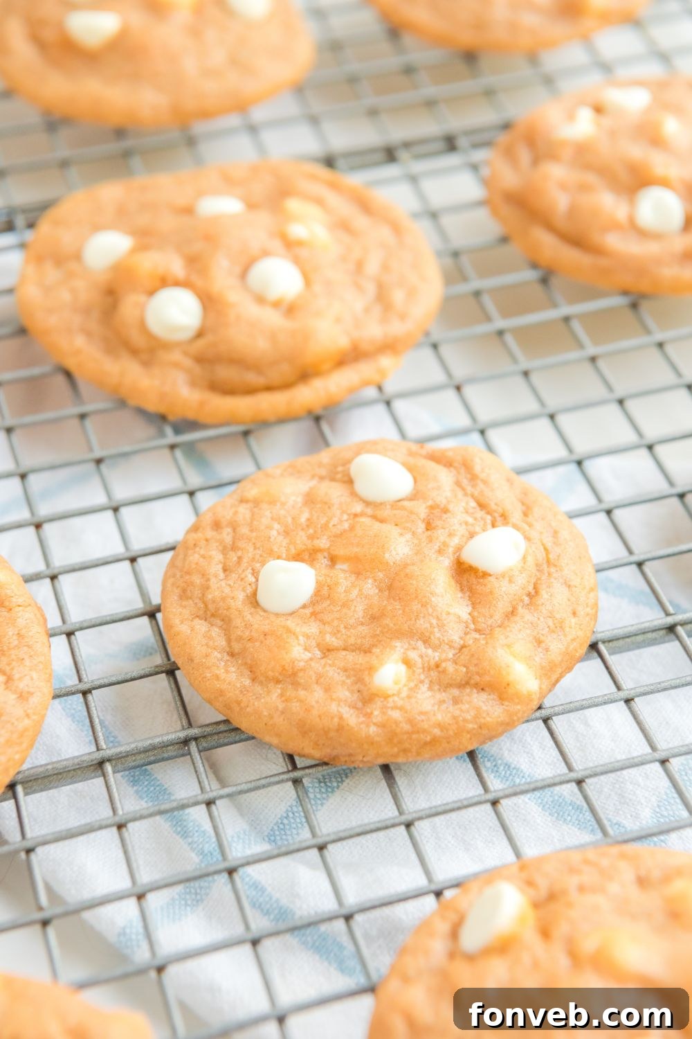 pumpkin cookies on a baking tray 