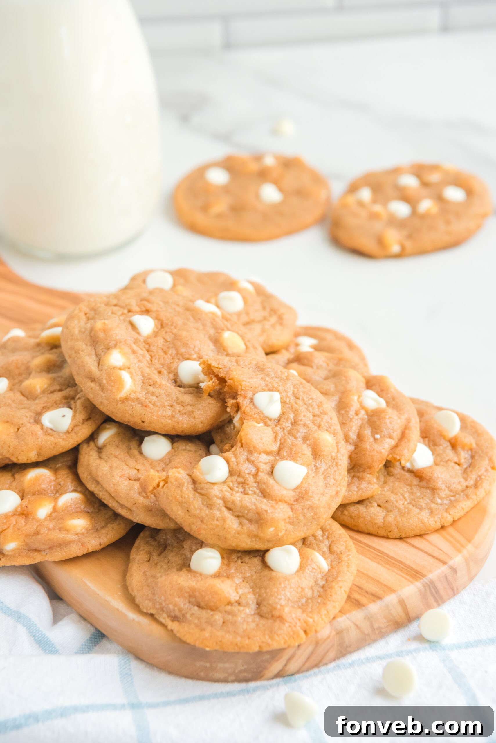 Pumpkin Spice Pudding Cookies on a wooden cutting board