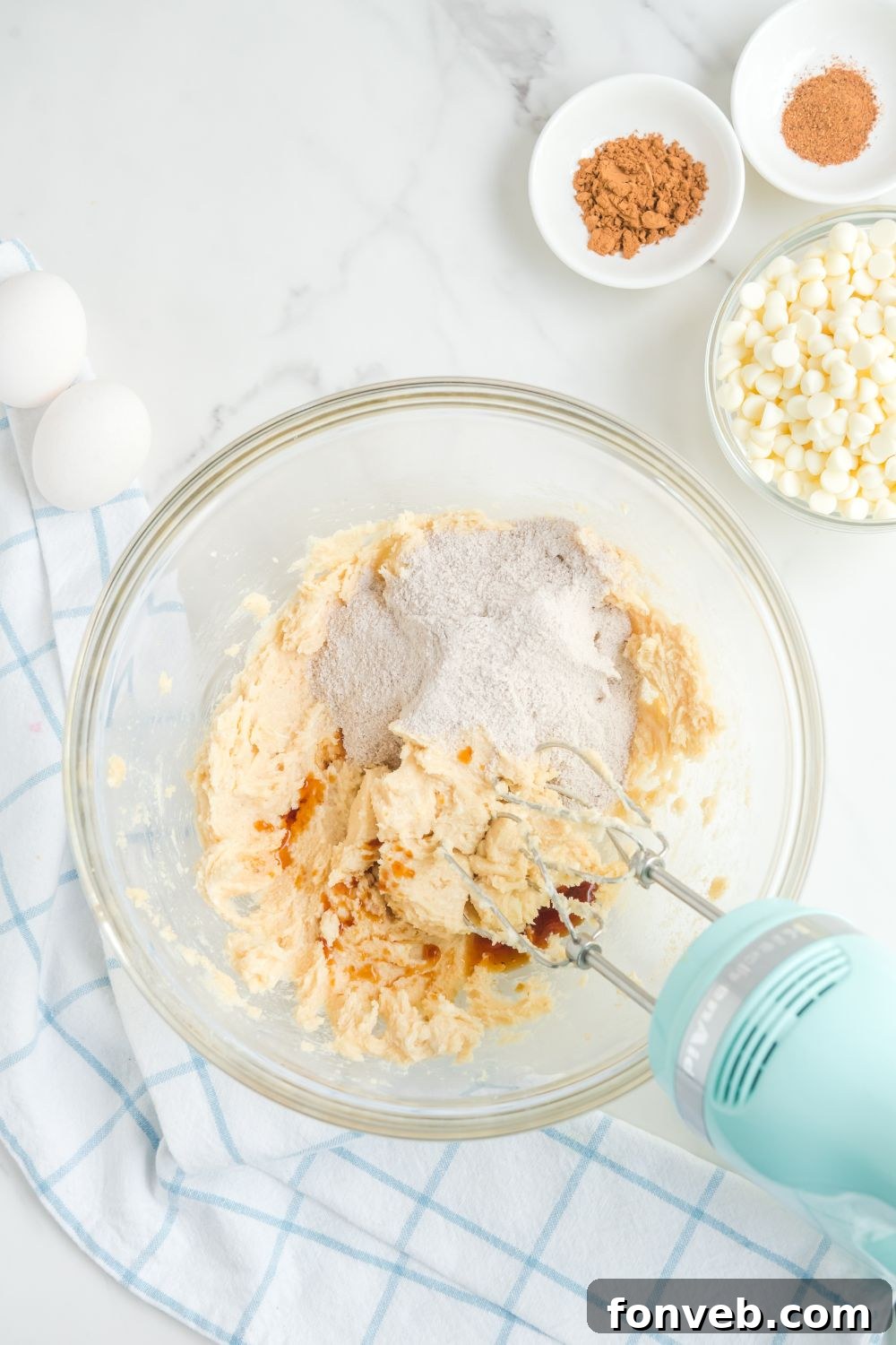 ingredients for cookies mixing in a glass bowl 