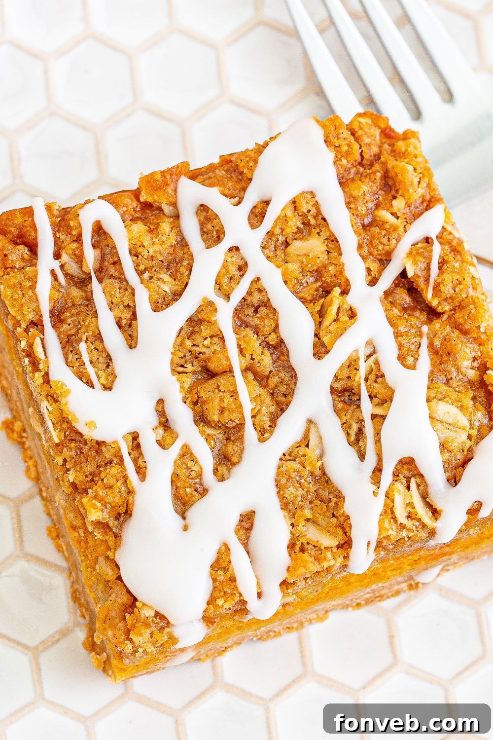 pumpkin crumble bar on plate with fork