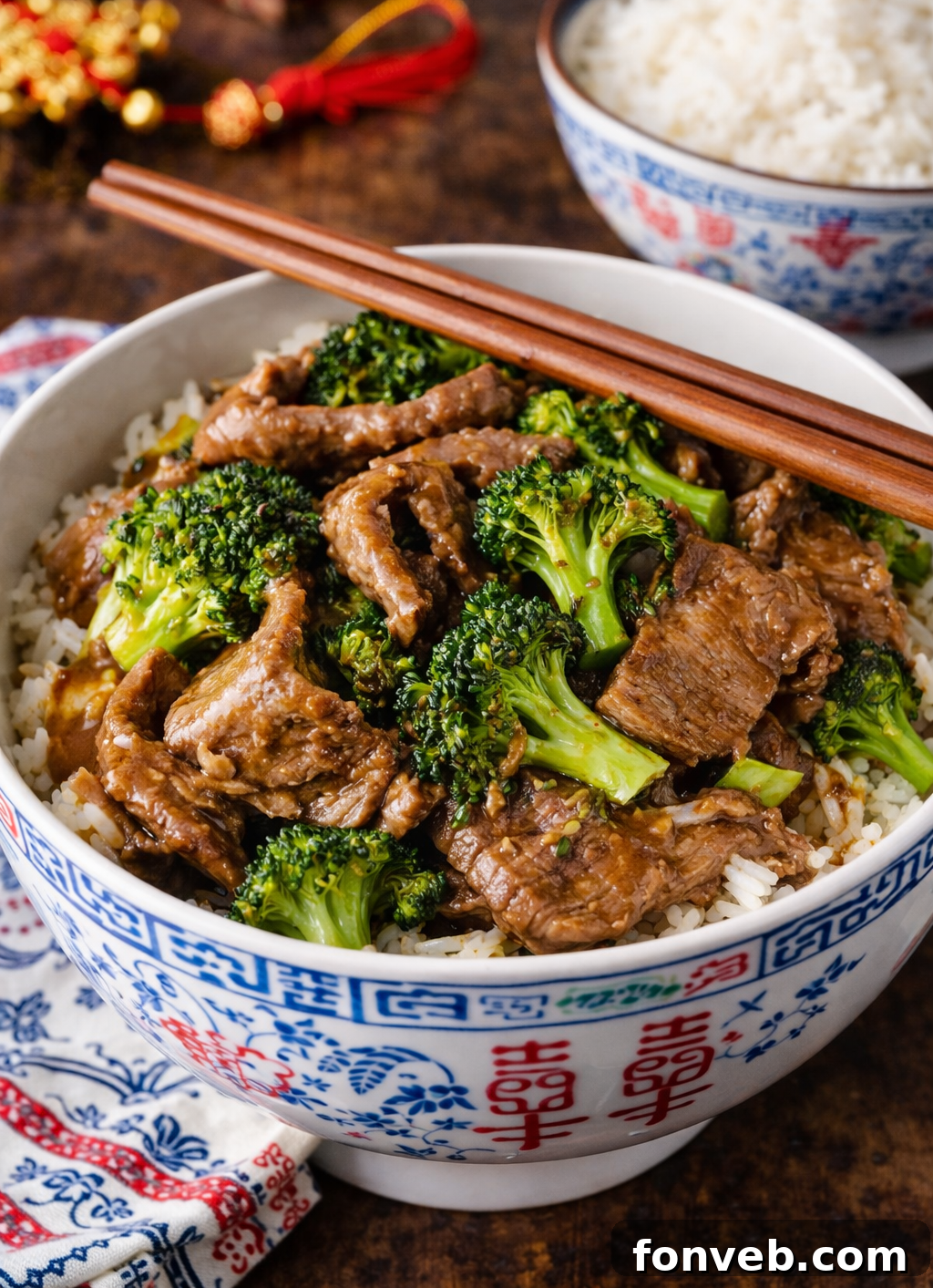 Slow Cooker Beef & Broccoli in a pretty chinese printed bowl