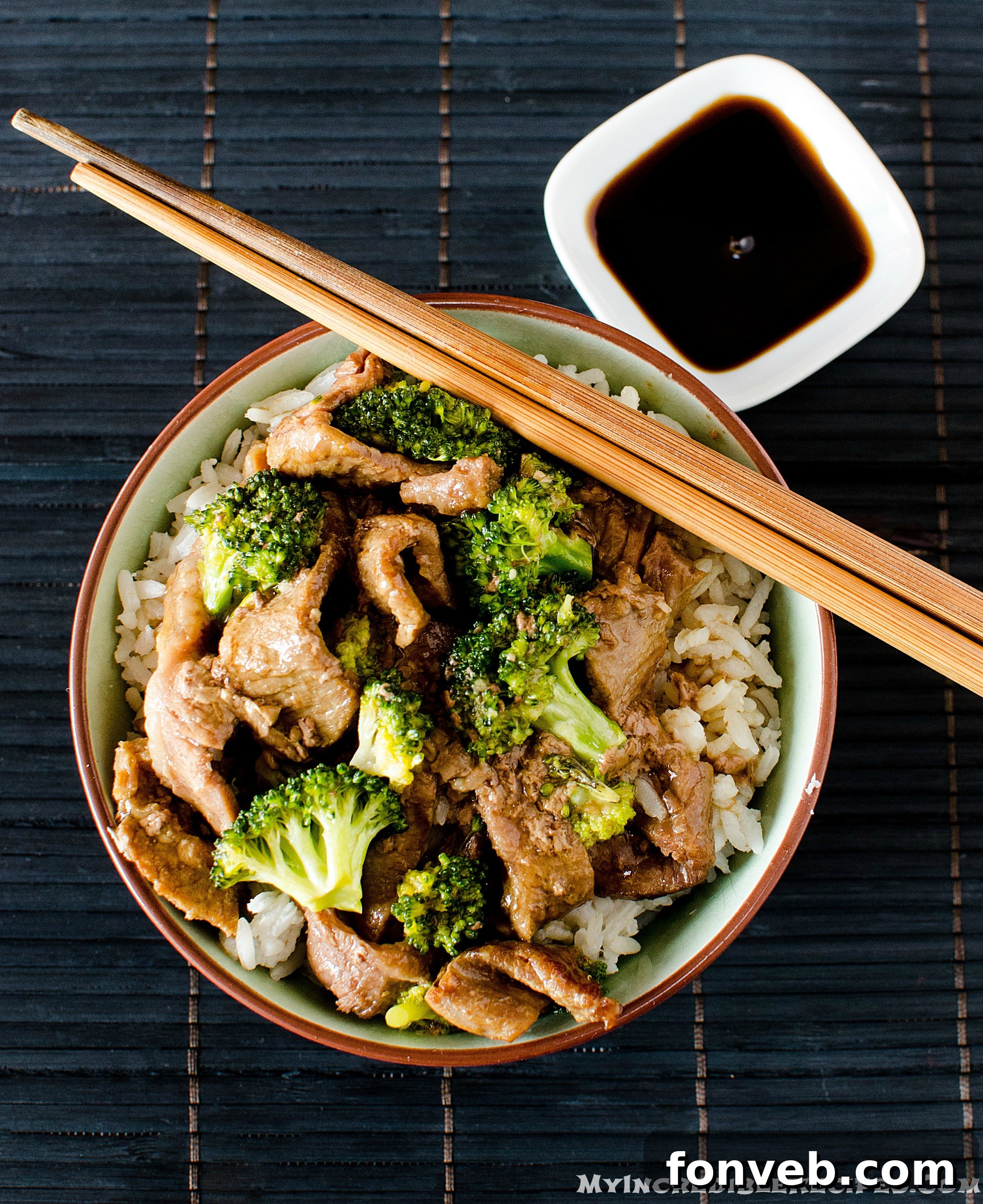 overhead shot of the Slow Cooker Beef & Broccoli in a pretty chinese printed bowl