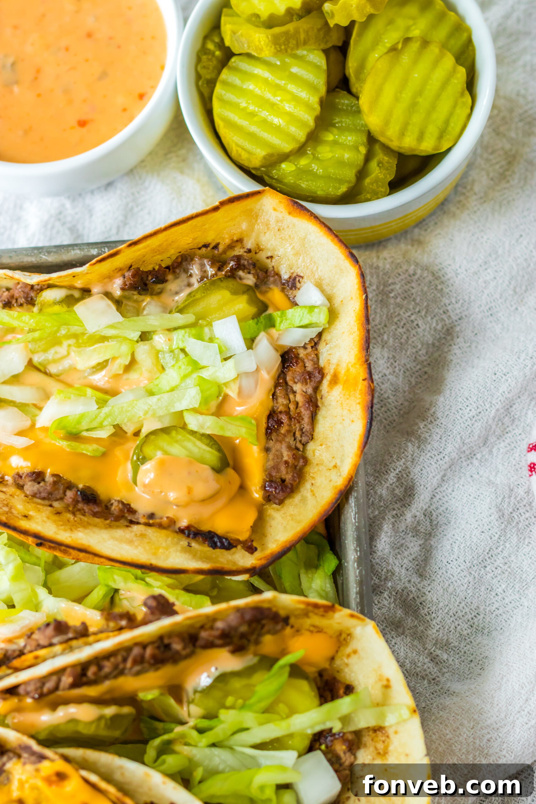 Smashed Big Mac Tacos 3 Close-up shot of a Big Mac smash taco, highlighting the crispy beef and fresh toppings