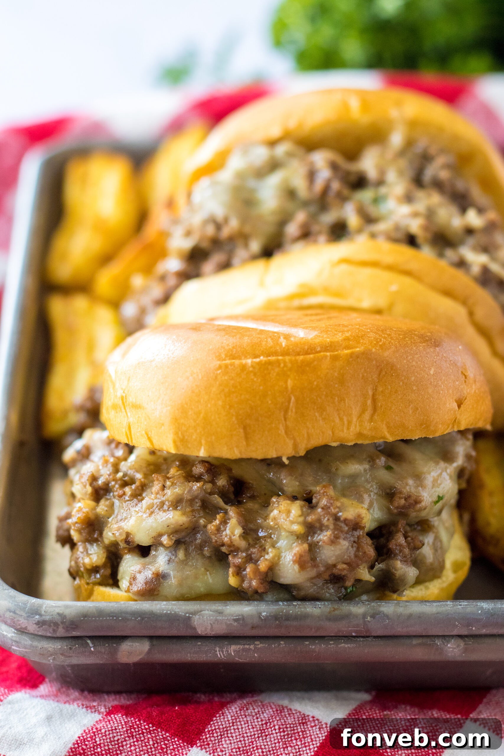 au jus sandwich on a metal tray up close showing texture 