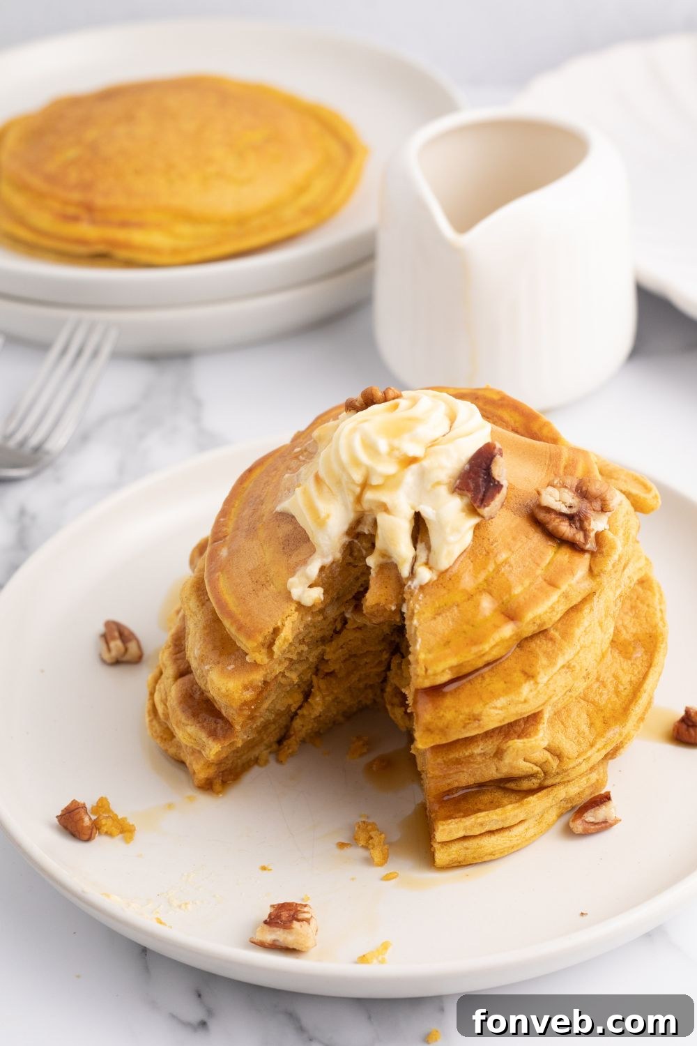 slice of pancake with bite taken out of it