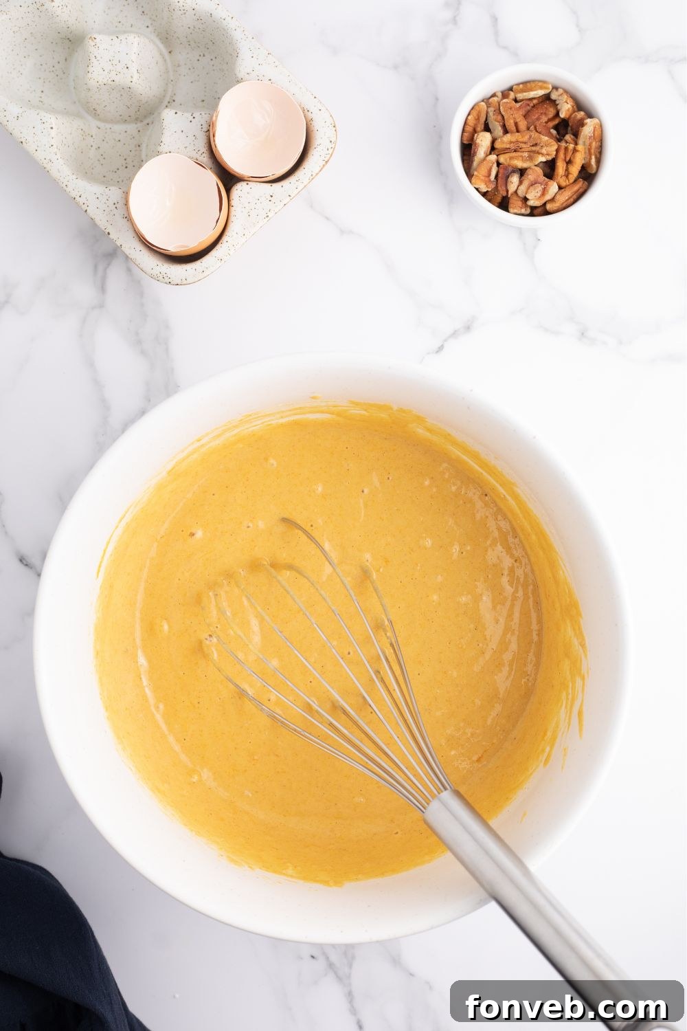 mixing pumpkin mix in a bowl