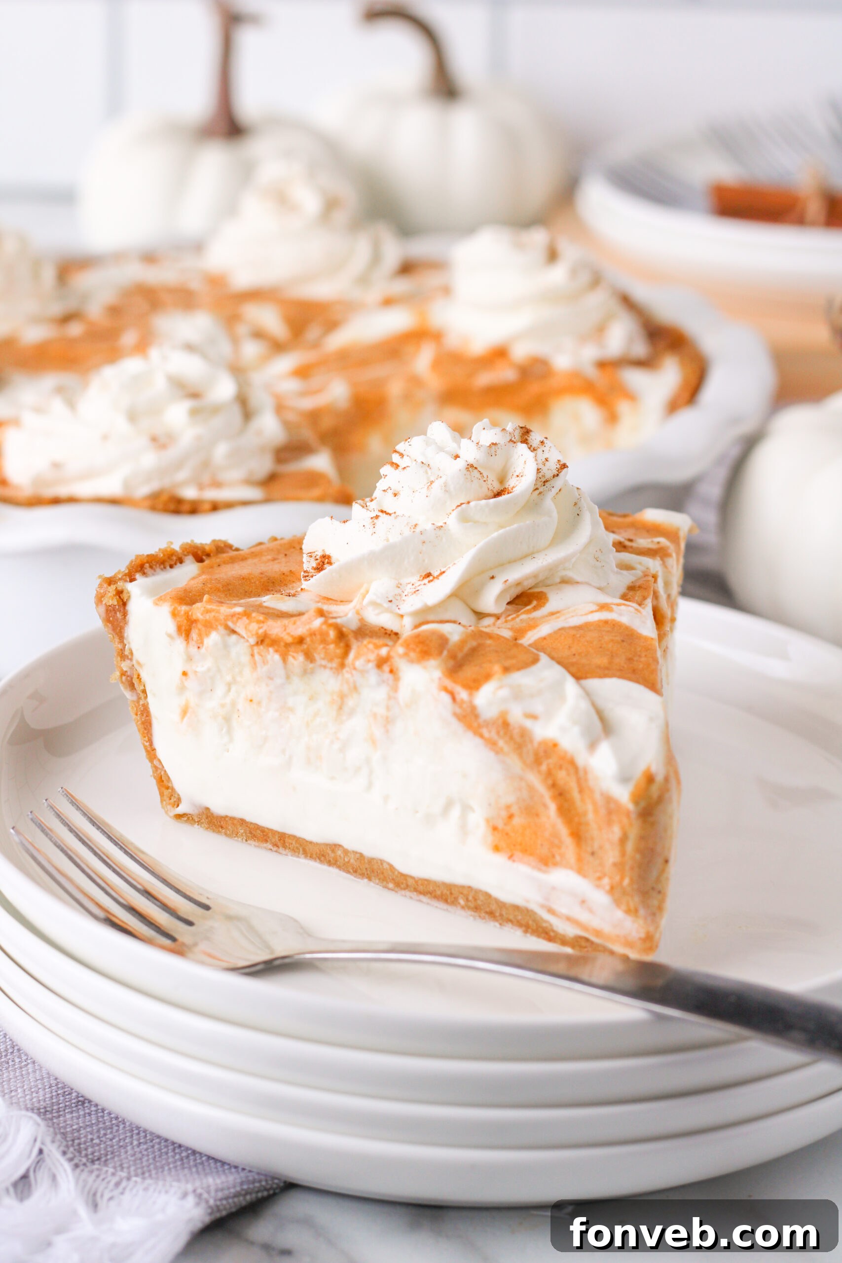Spiced Pumpkin Ice Cream Pie 2 Pumpkin Ice Cream Pie Slice on a white plate