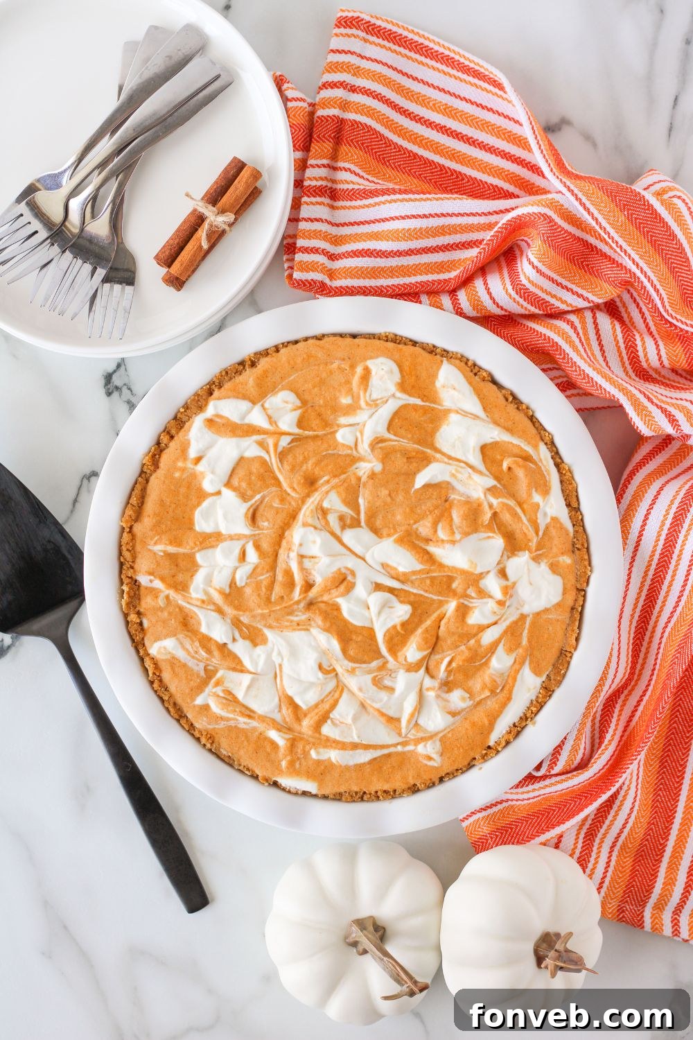 Spiced Pumpkin Ice Cream Pie 17 overhead shot of pie on a marble countertop