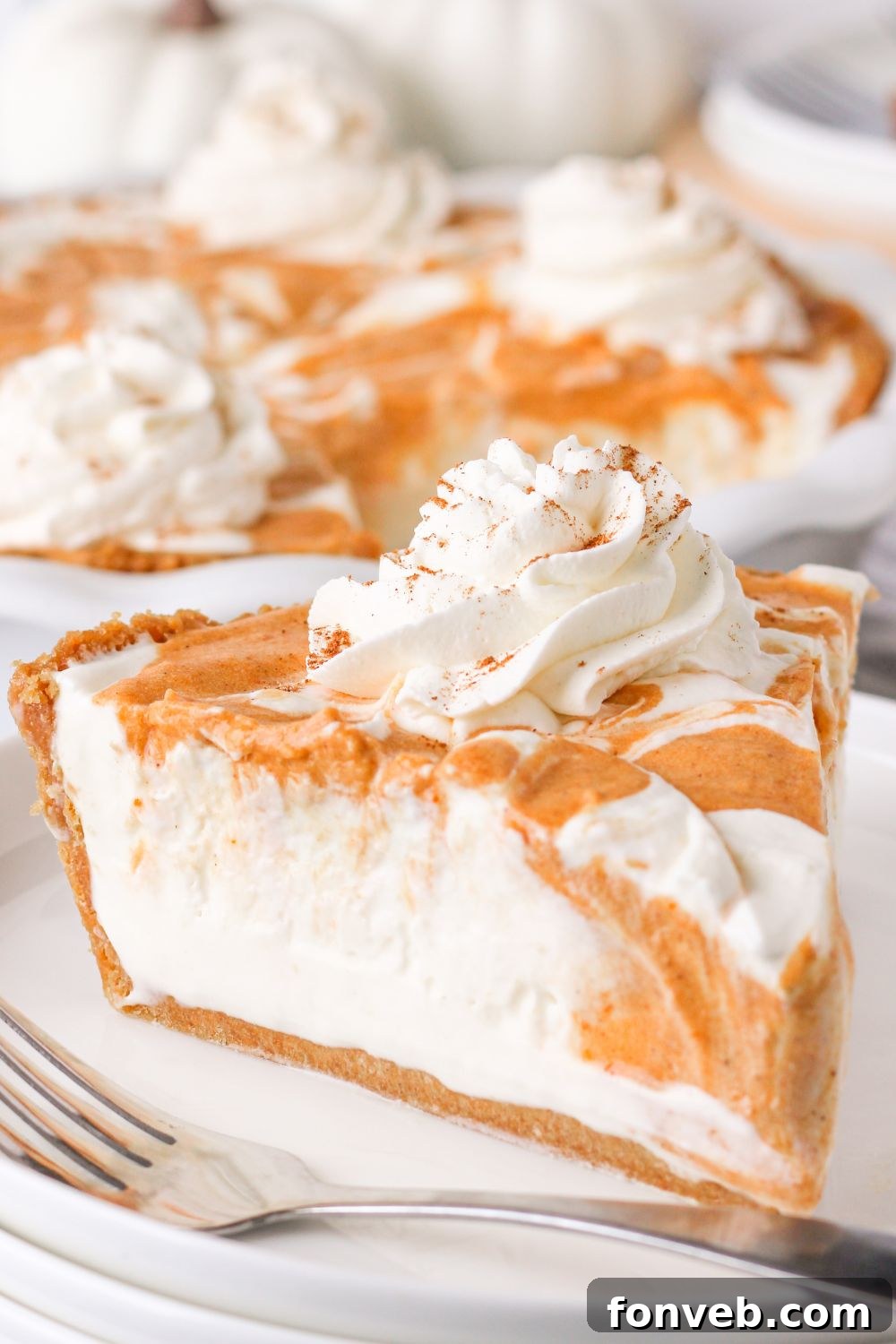 Spiced Pumpkin Ice Cream Pie 18 slice of pie on plate with fork by it