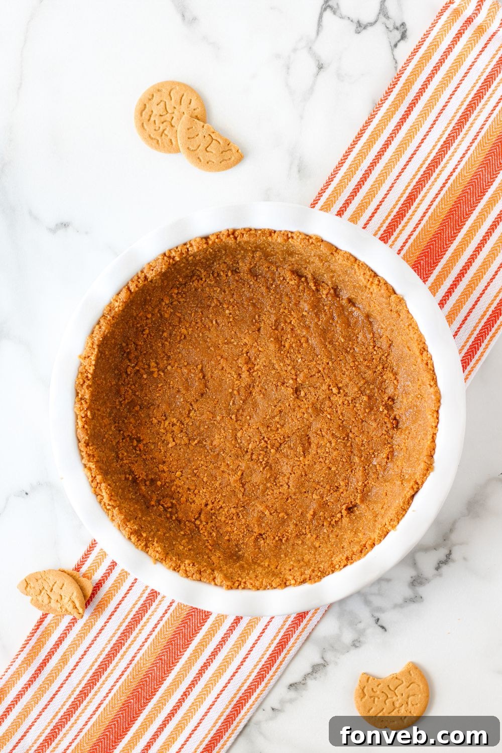Spiced Pumpkin Ice Cream Pie 9 gingersnap crust in a pan on table