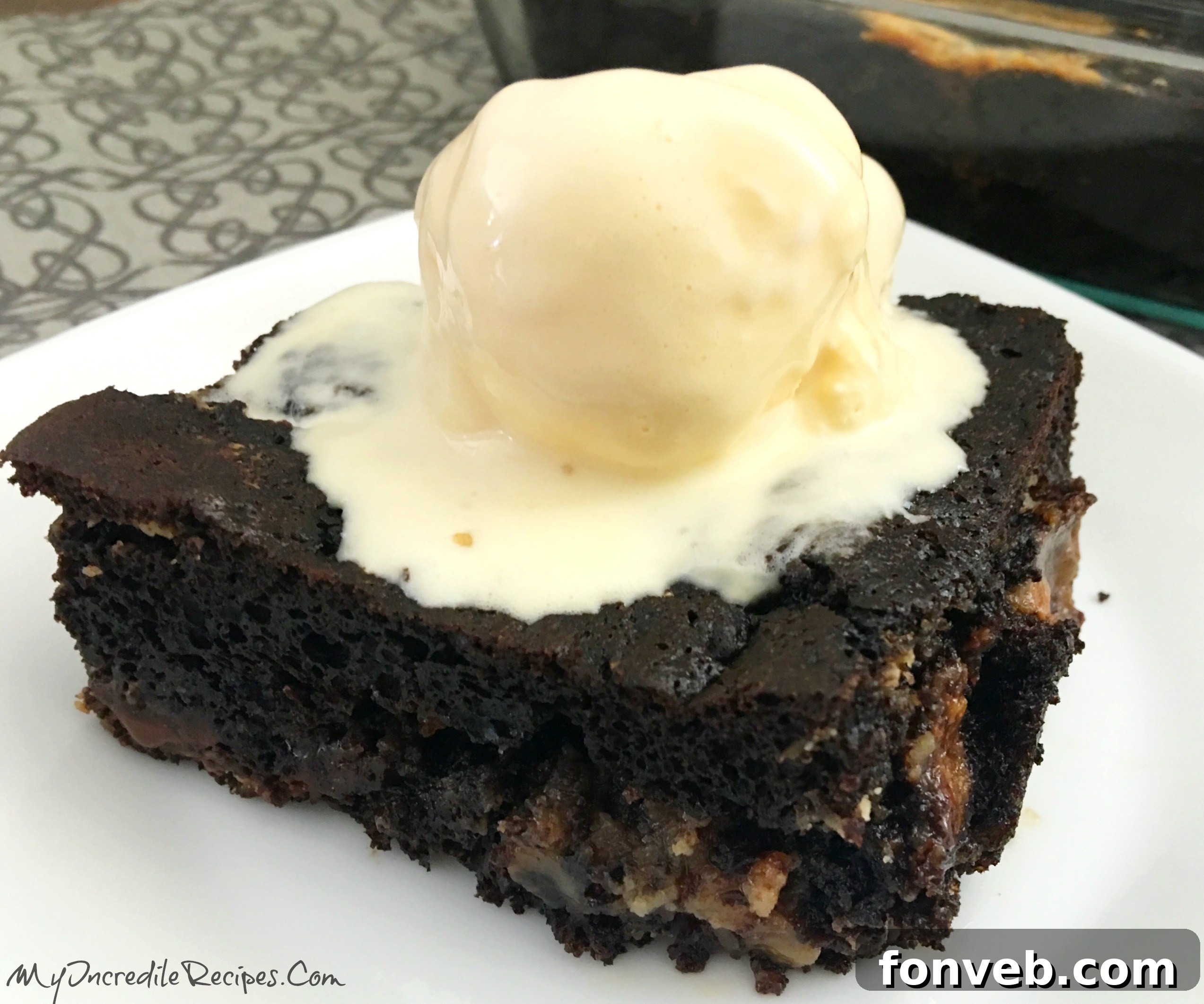 Close-up shot of the gooey and rich interior of the Peanut Butter Earthquake Cake, with visible peanut butter and chocolate chunks