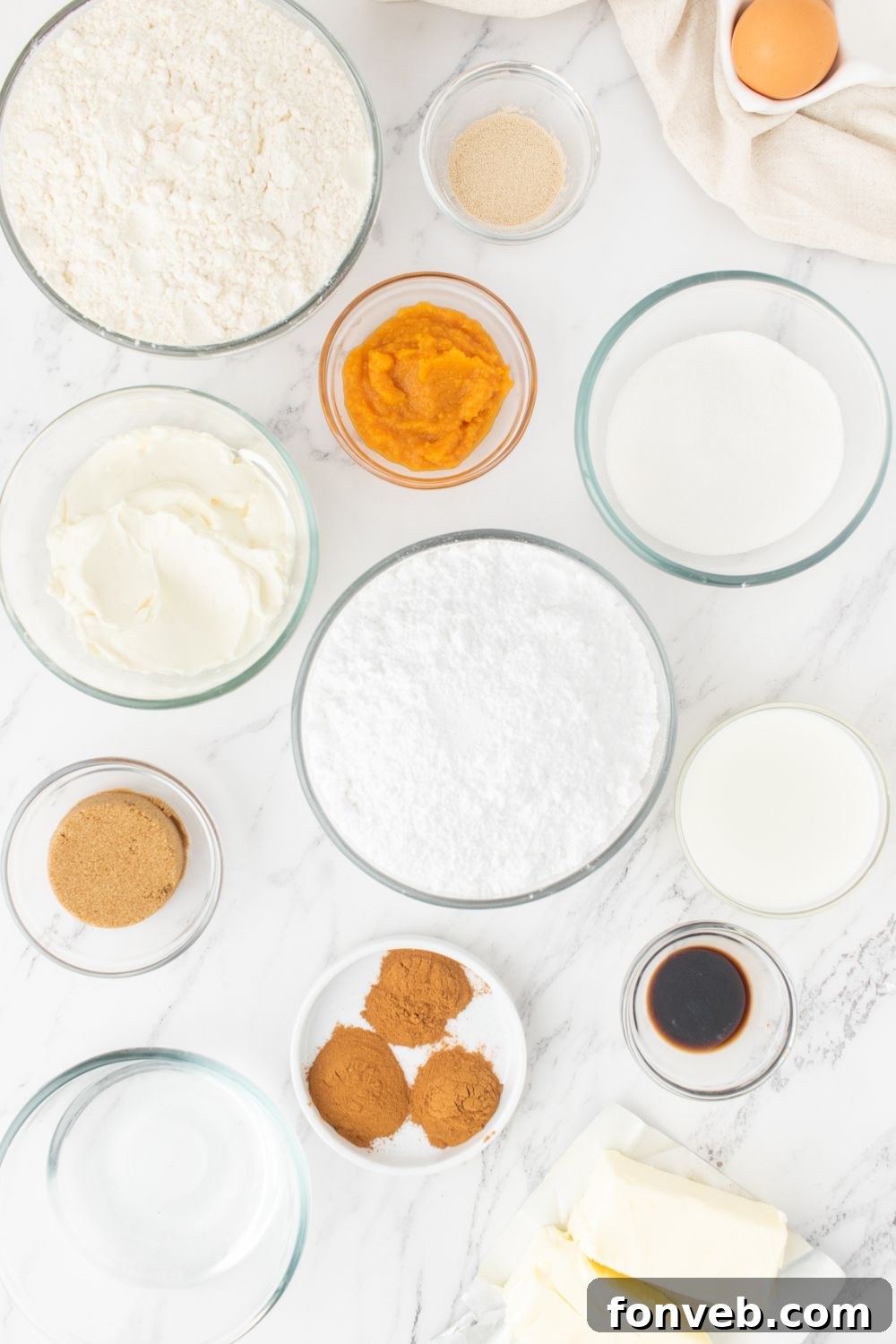 cinnamon roll ingredients in bowls on counter 