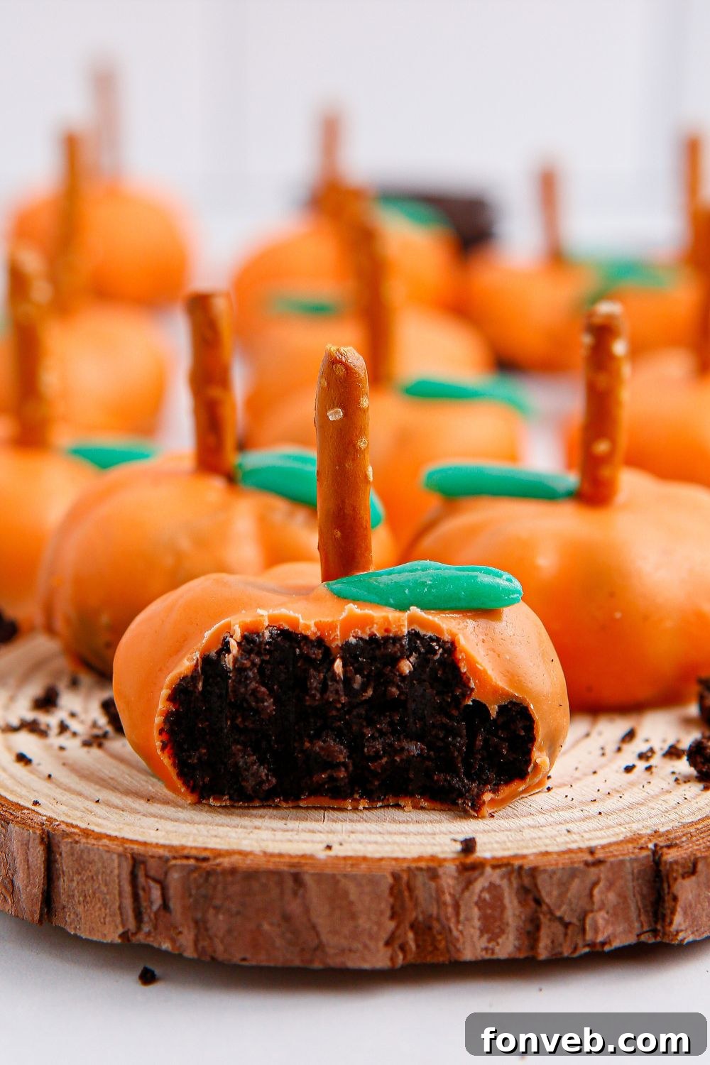 Pumpkin Spiced Oreo Truffles 18 close up of truffle with bite taken out