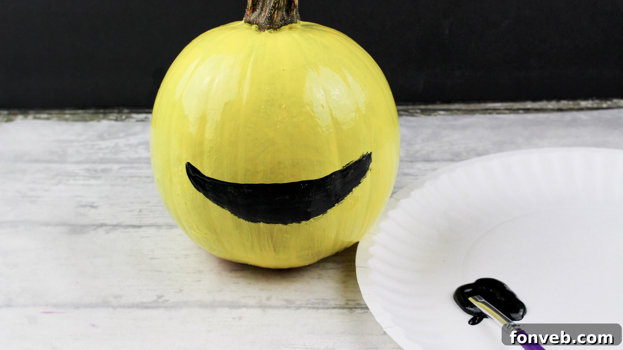 Pumpkins with Personality 7 Another image showing the prepared yellow pumpkins, emphasizing the smooth base coat achieved for the emoji designs.