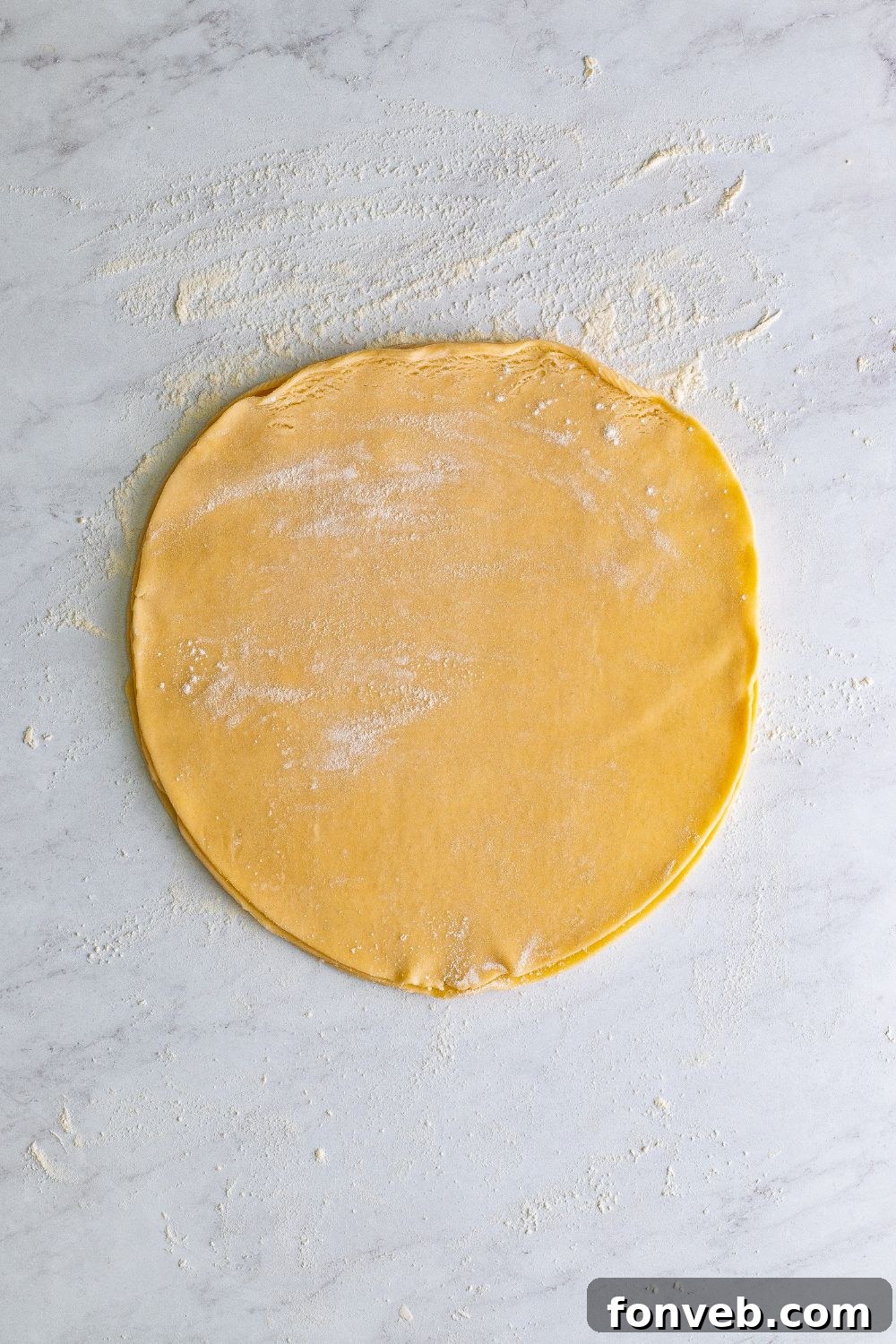 pie crust rolled out on table