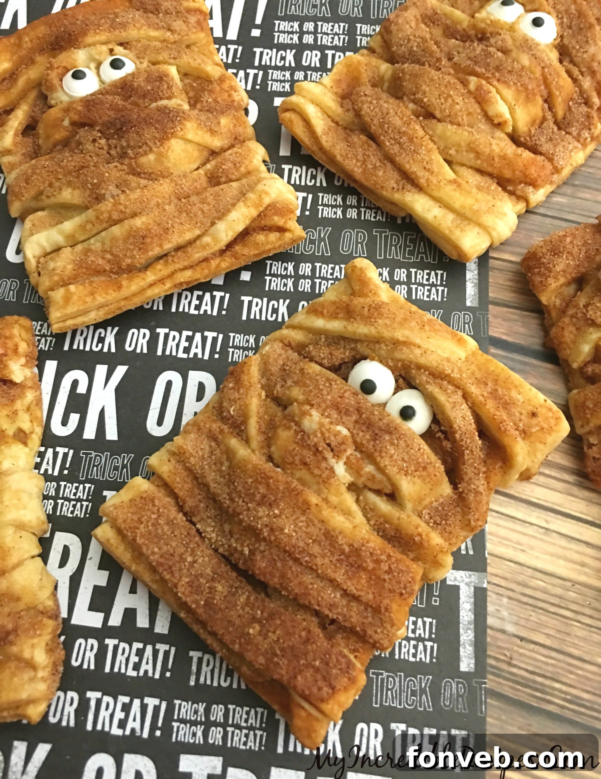 Adorable Pumpkin Cheesecake Mummy Cookies ready for Halloween