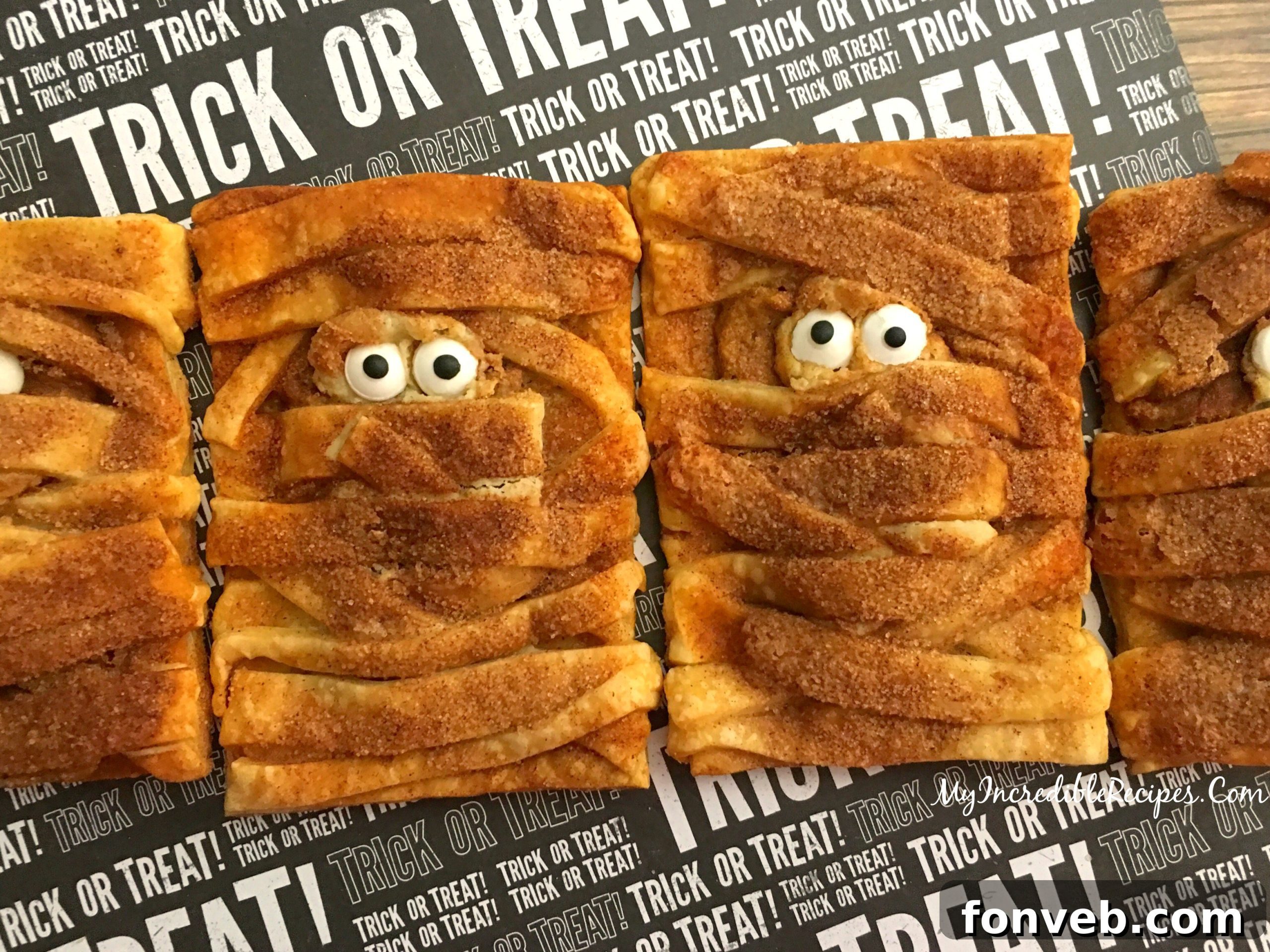 Almost too cute to eat, but utterly irresistible Pumpkin Cheesecake Mummy Cookies