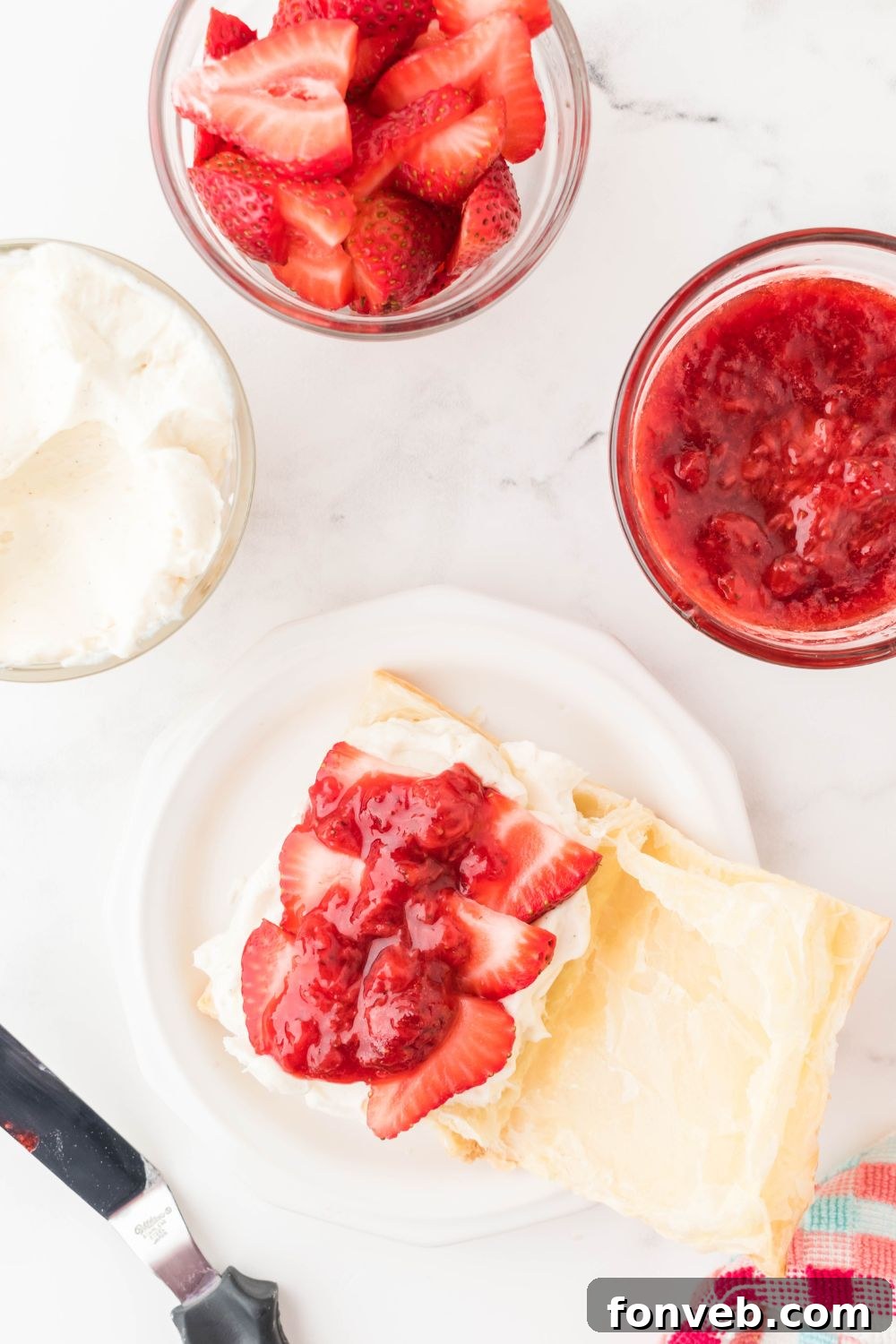 cream cheese mixture and berries in filling of puff pastry