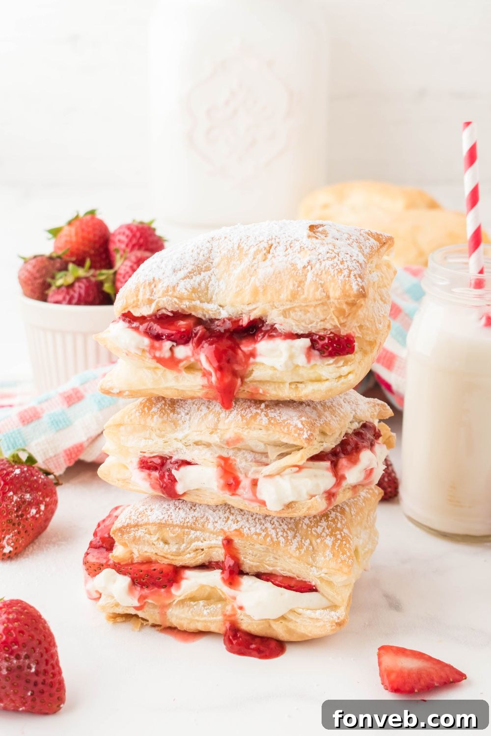 stacked puff pastry desserts on table