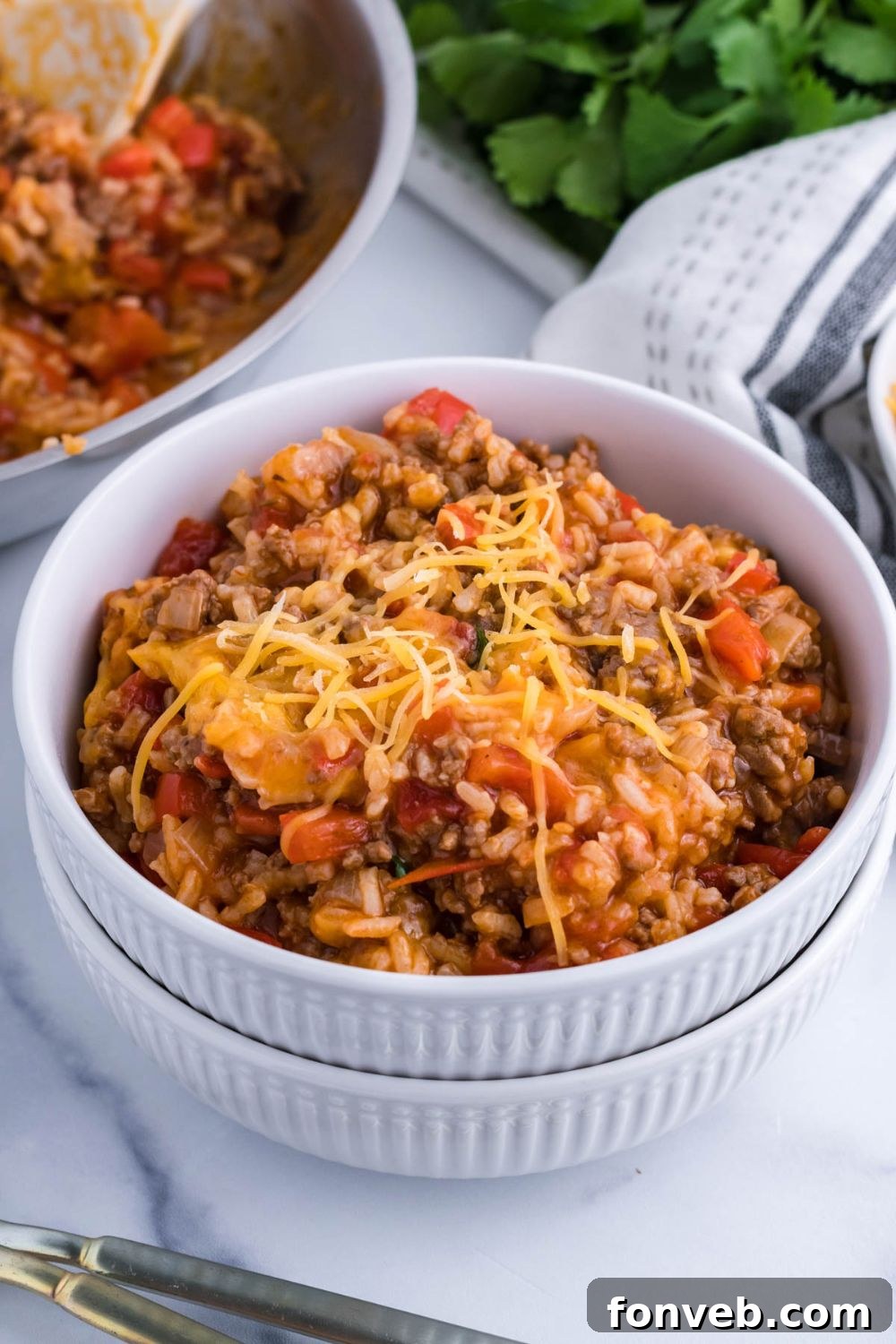 bowls with pepper an rice mixture in it 