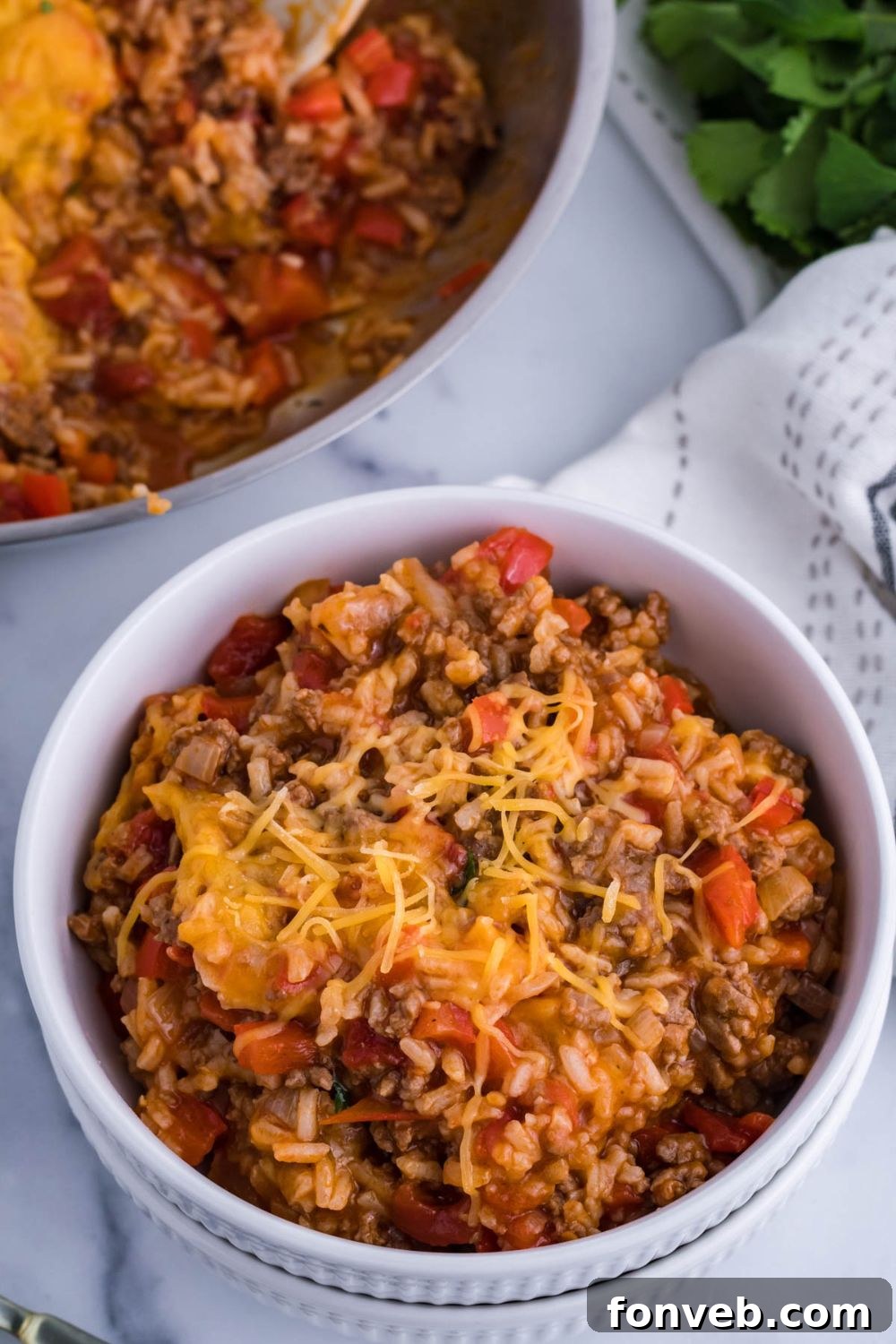 rice casserole in pan and bowl on table 
