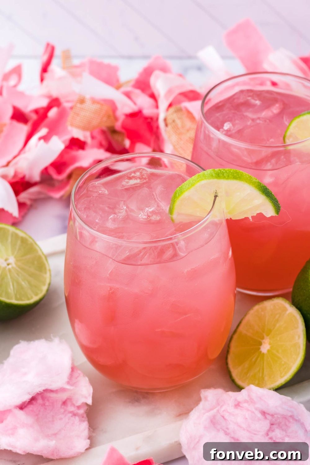 glasses with a sweet cocktail on top of it