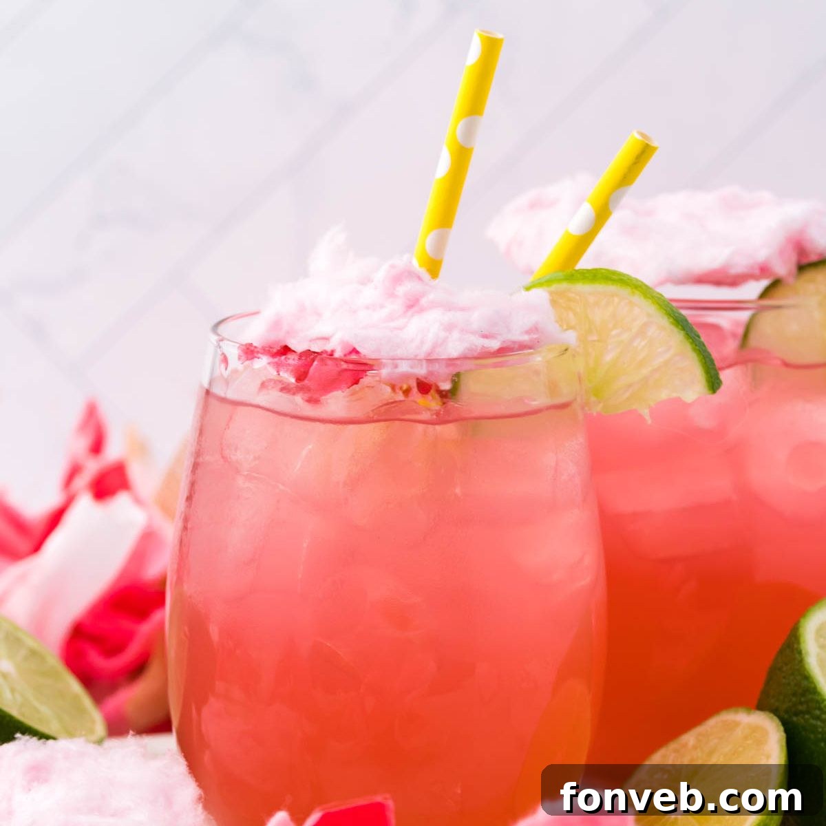 Cotton Candy Margaritas on table with straws in glasses