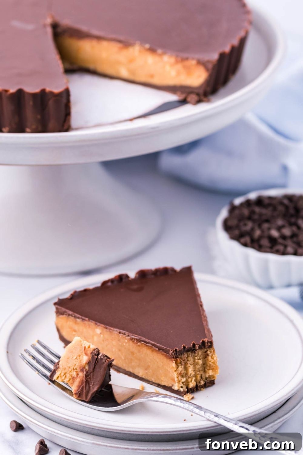 giant peanut butter cup pie slice on table