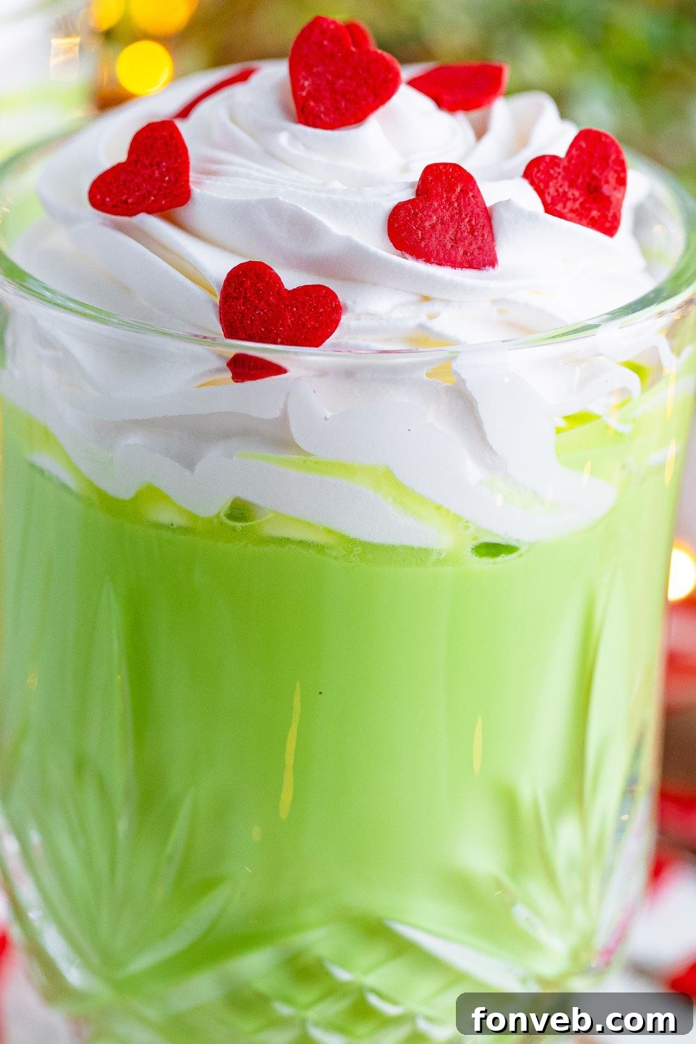 Grinch mug with hot chocolate and whipped cream