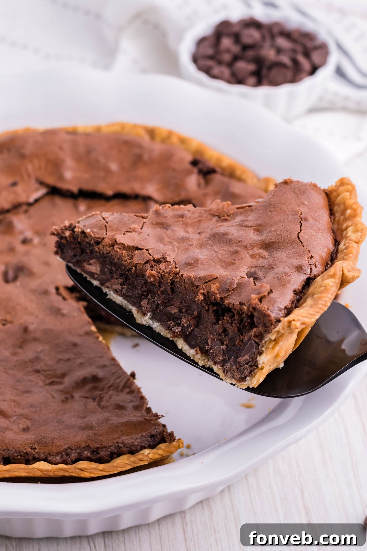 Fudgy Brownie Pie Perfection 18 Two wide slices of fudge brownie pie, still in the pan, waiting to be served.