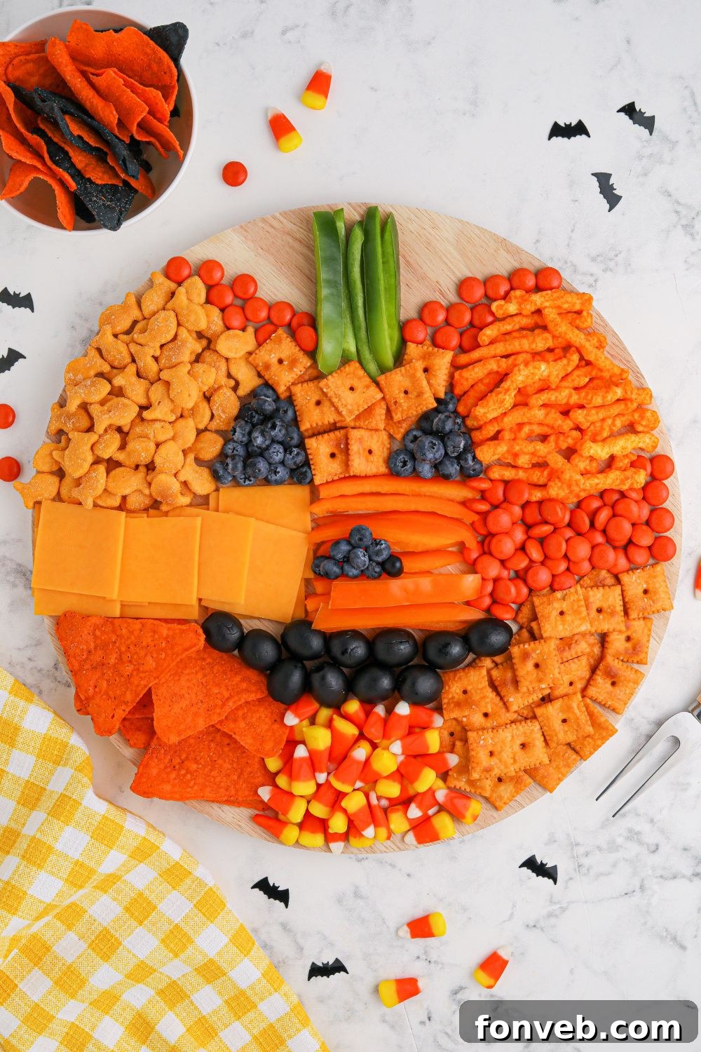 Detailed overhead view of the charcuterie pumpkin board, showing the artful arrangement.