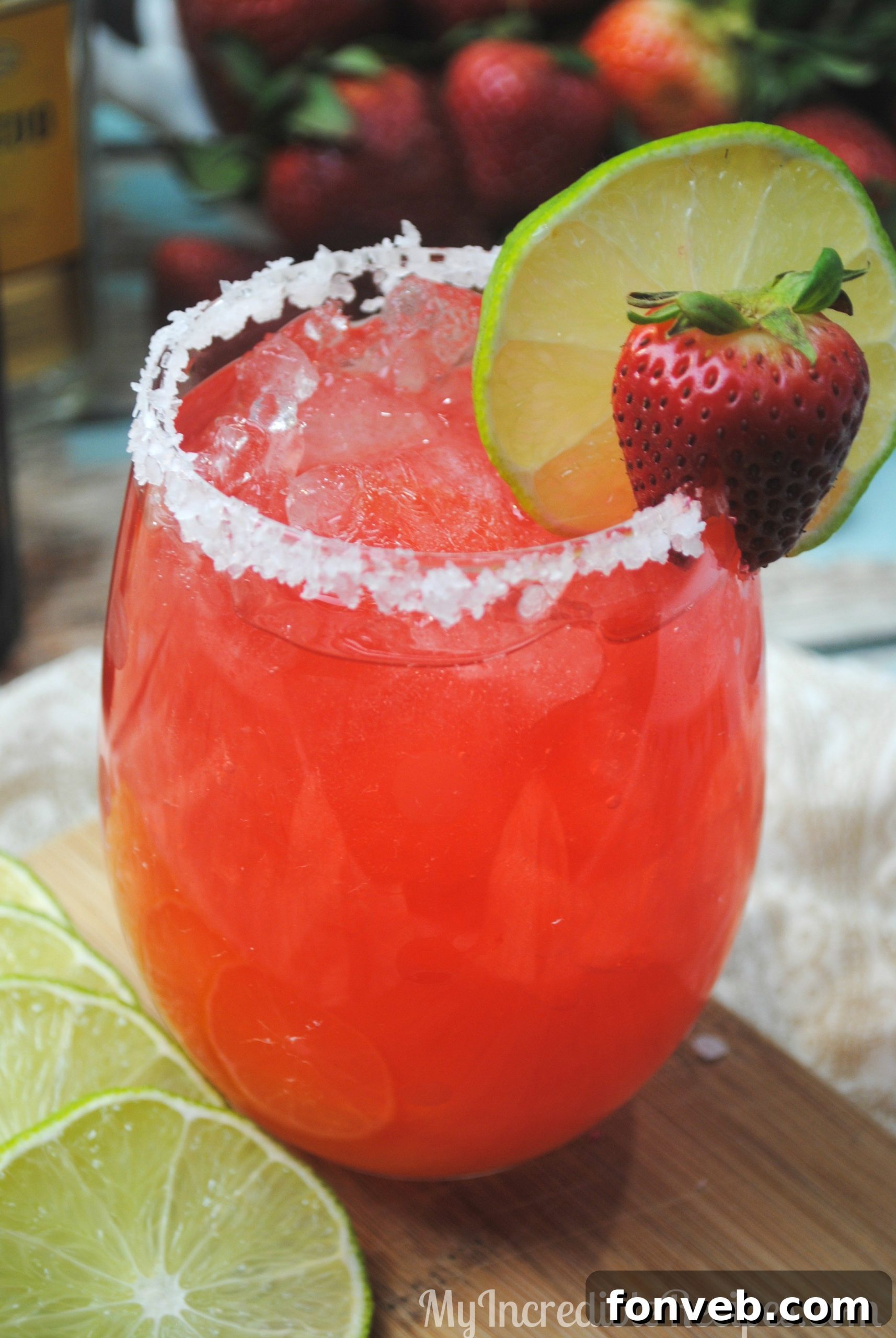 Elegant serving of Strawberry Margarita Punch with fresh fruit.